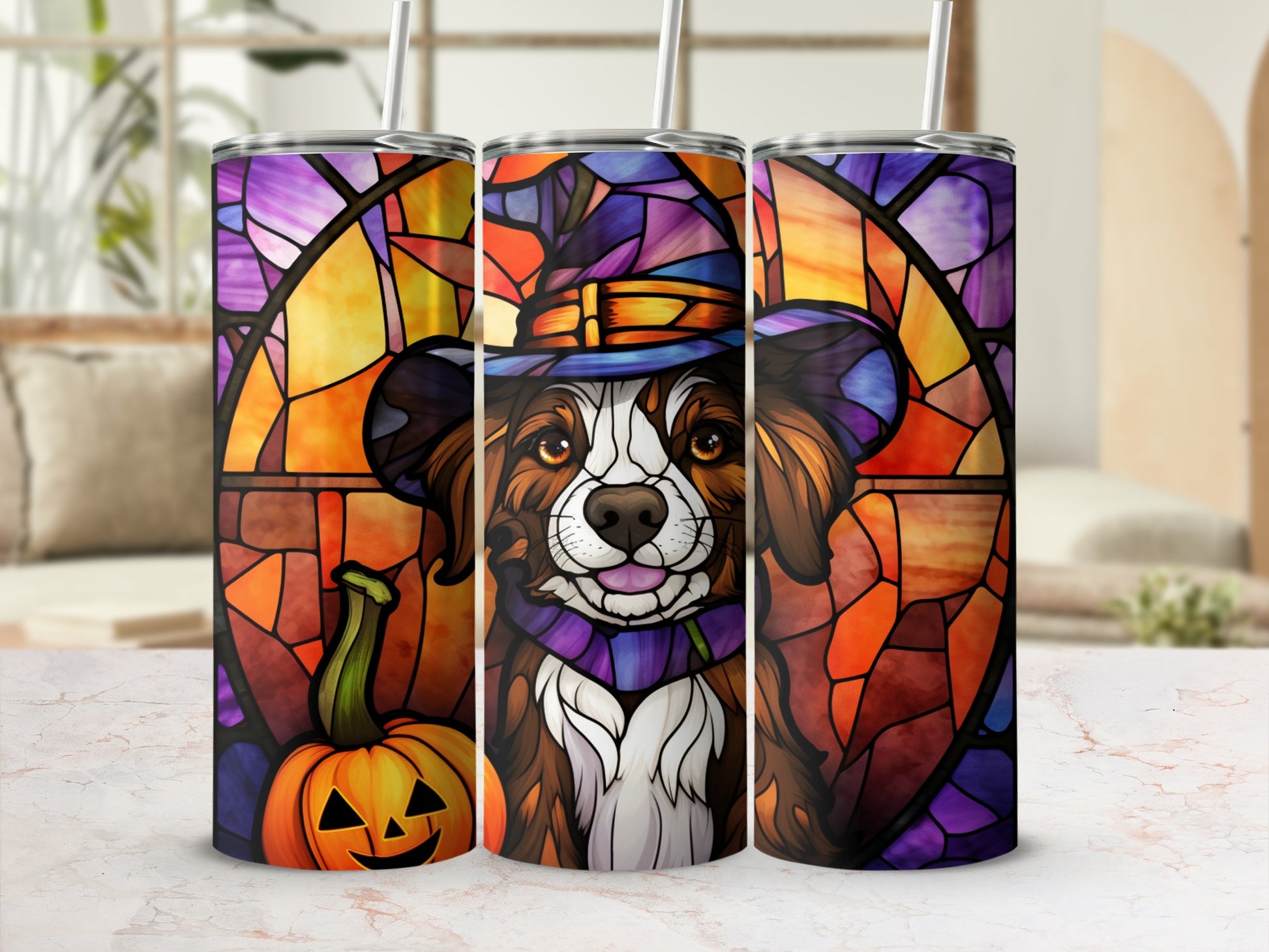 Stained glass dog in witch hat with pumpkin, on three tumblers.