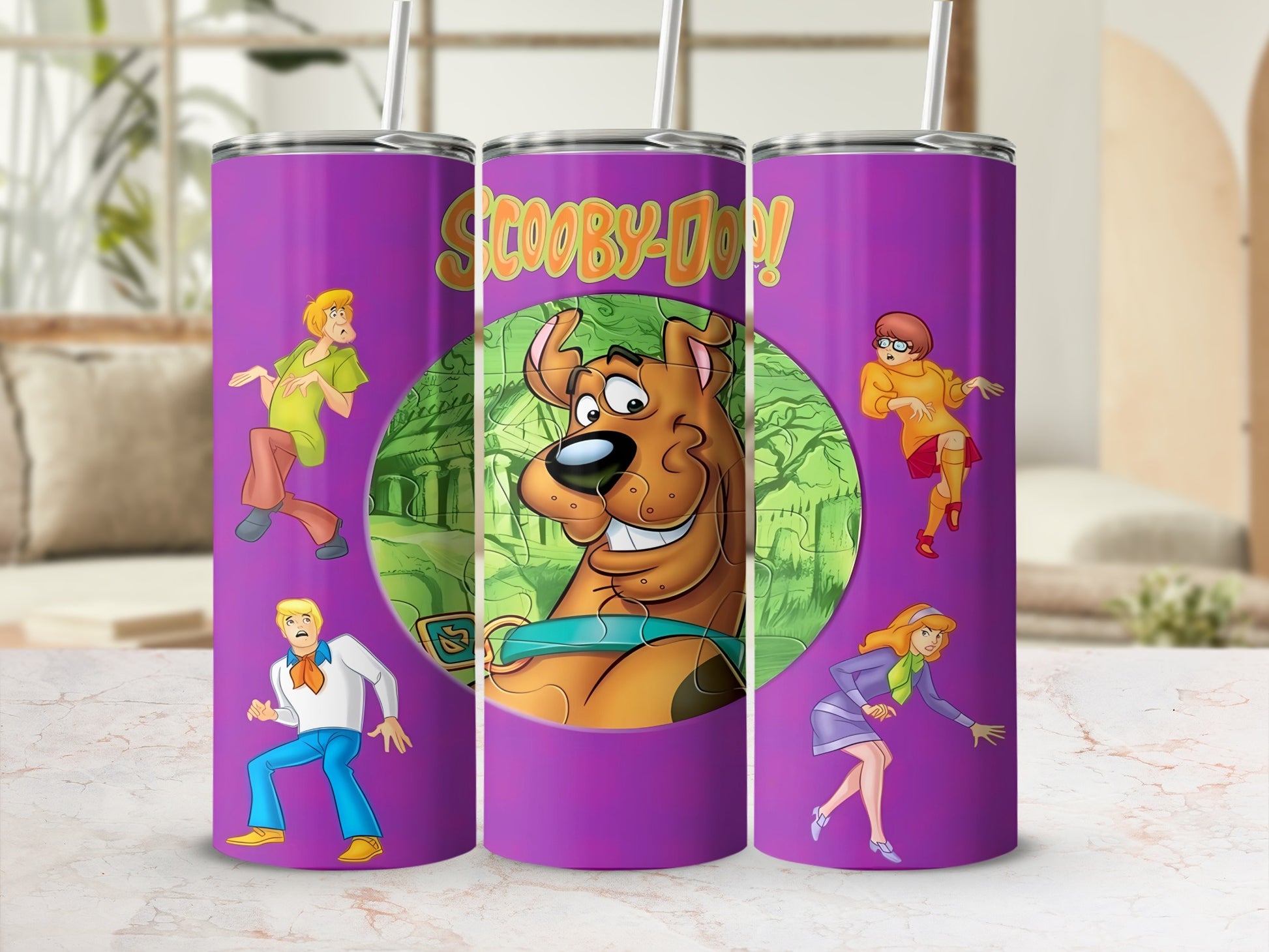 Scooby-Doo characters on a purple tumbler with a green background.