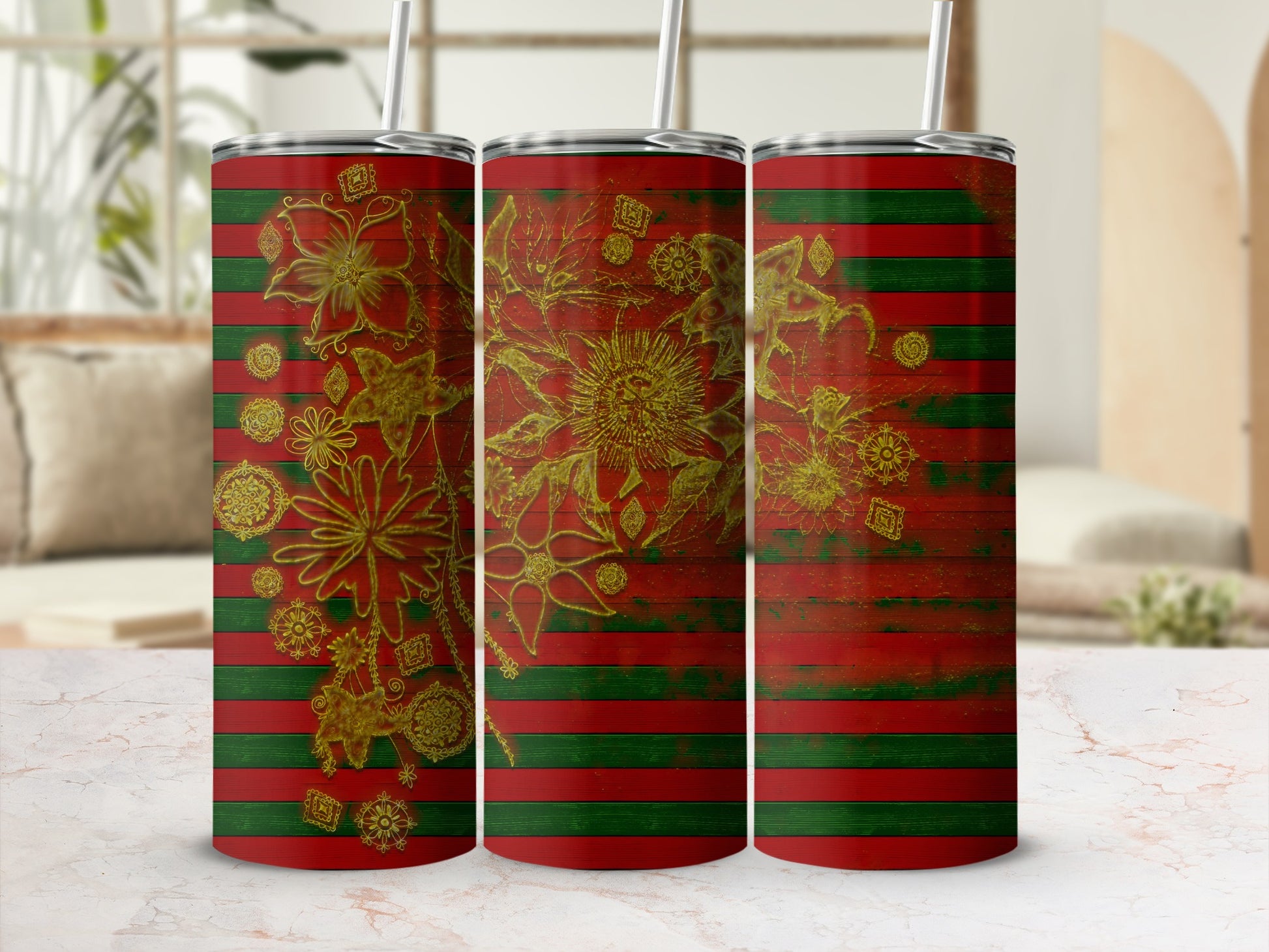 Green and red striped tumbler with gold floral embellishments.