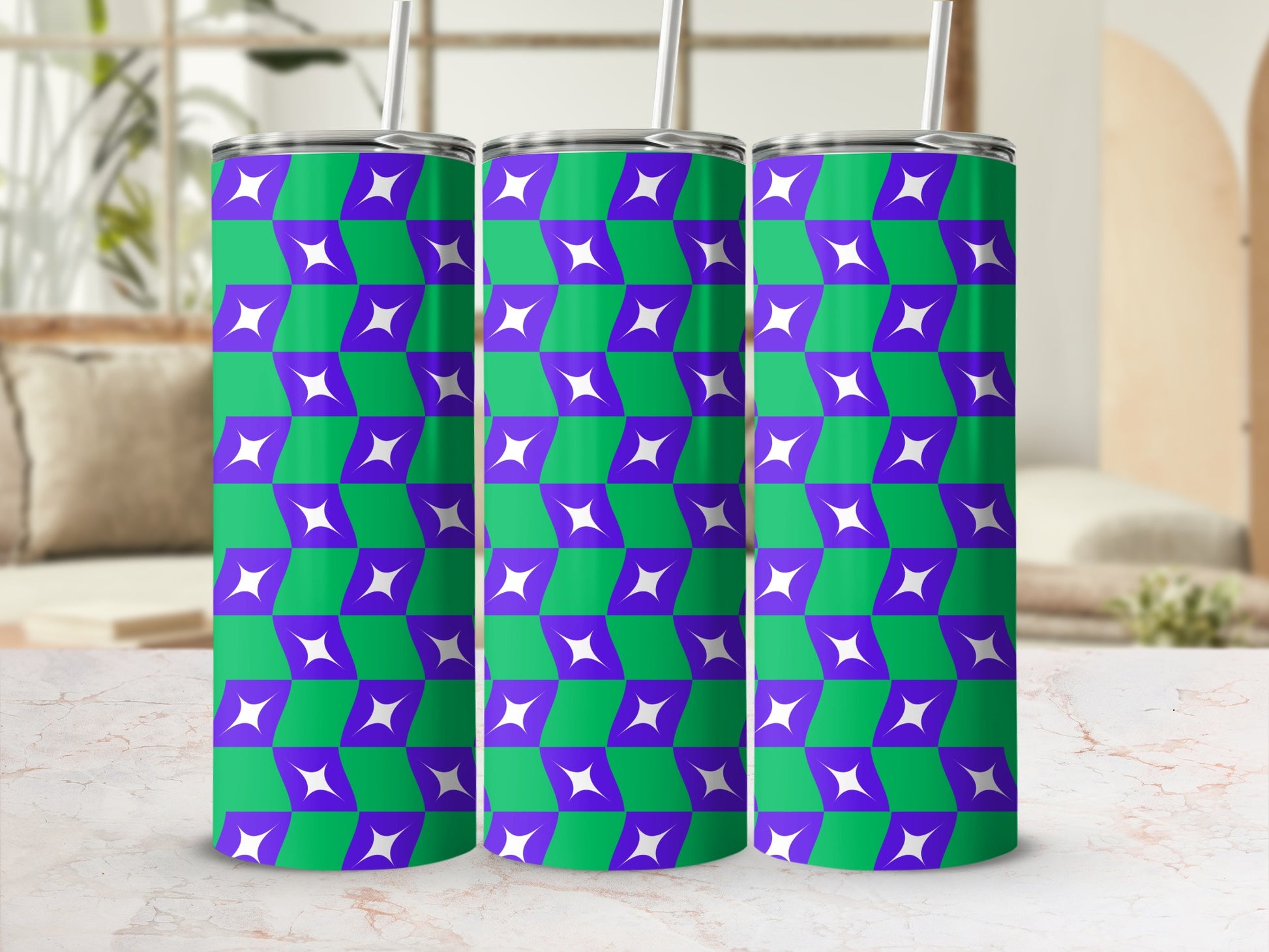 Three tumblers with a purple and green geometric star pattern.