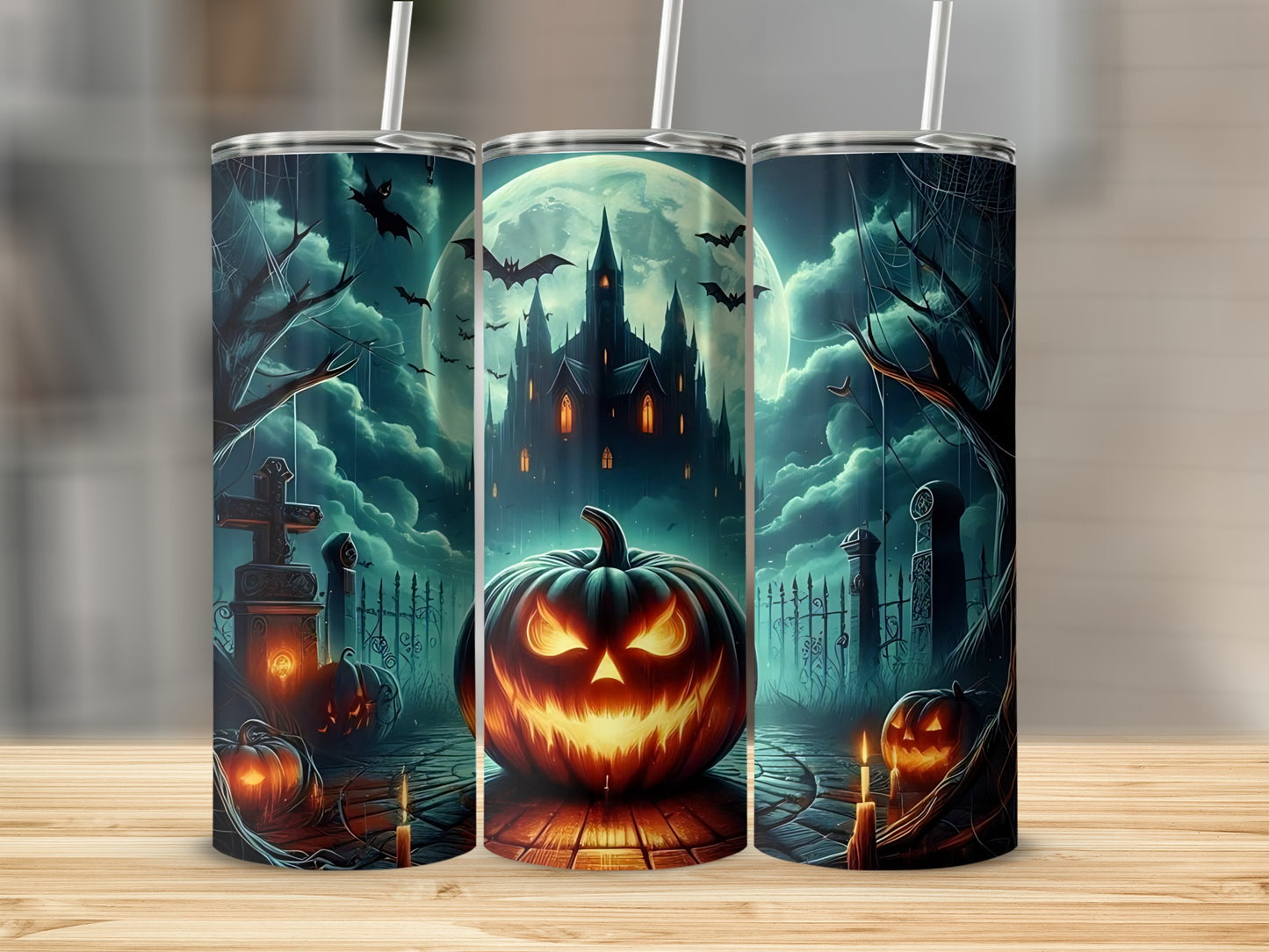 Halloween tumbler with jack-o'-lantern, spooky castle, bats, and cemetery scene.