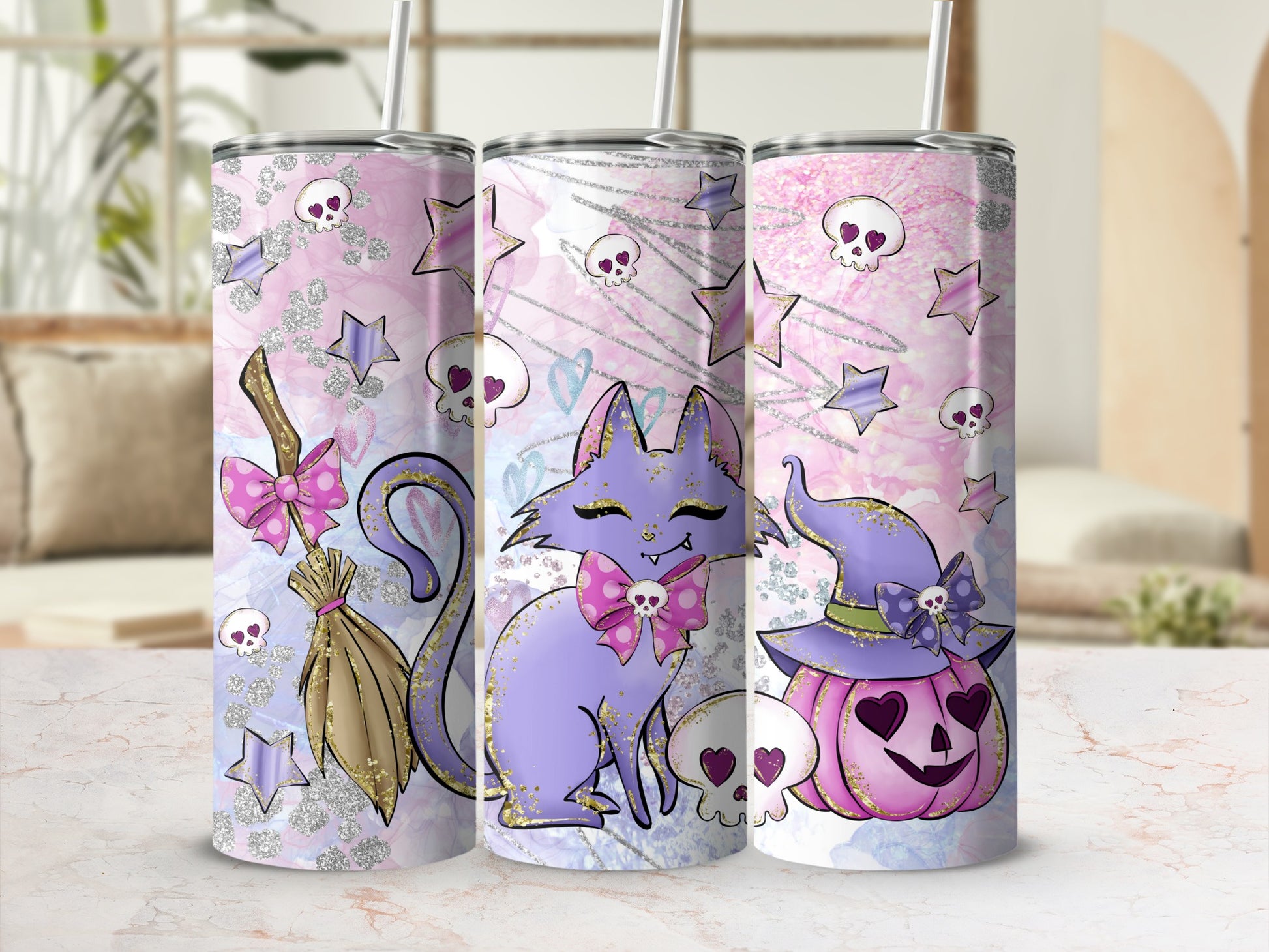 Three Halloween-themed tumblers: witch hat pumpkin, purple cat, and broomstick with glitter.