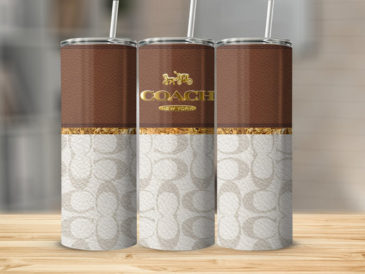Three Coach New York tumblers with brown leather and monogram patterns.