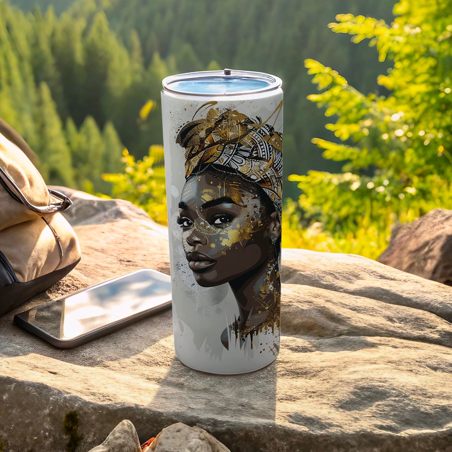 White tumbler with a detailed portrait of a woman with a head wrap and gold accents.