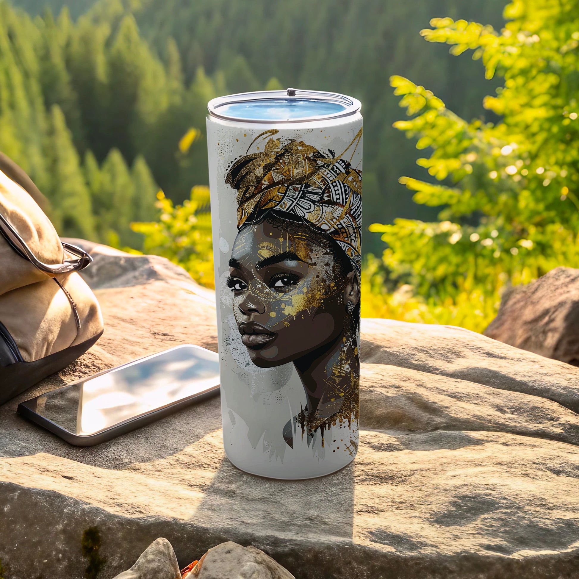 White tumbler with a detailed portrait of a woman with a head wrap and gold accents.