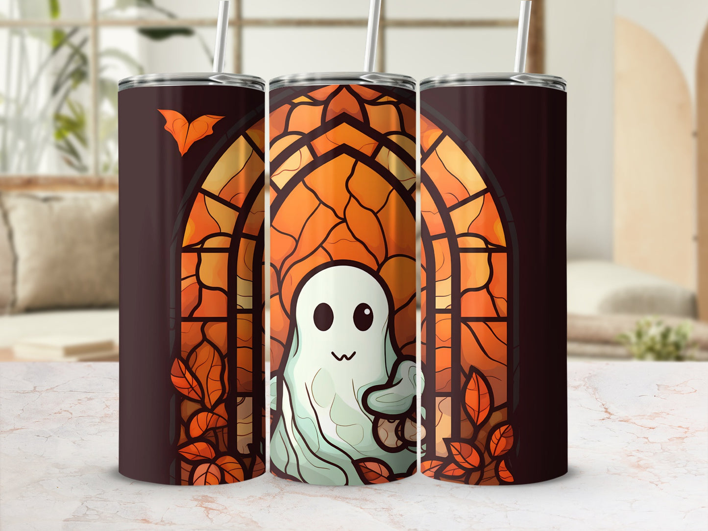 Ghost in stained glass window tumbler with fall leaves, on marble counter.