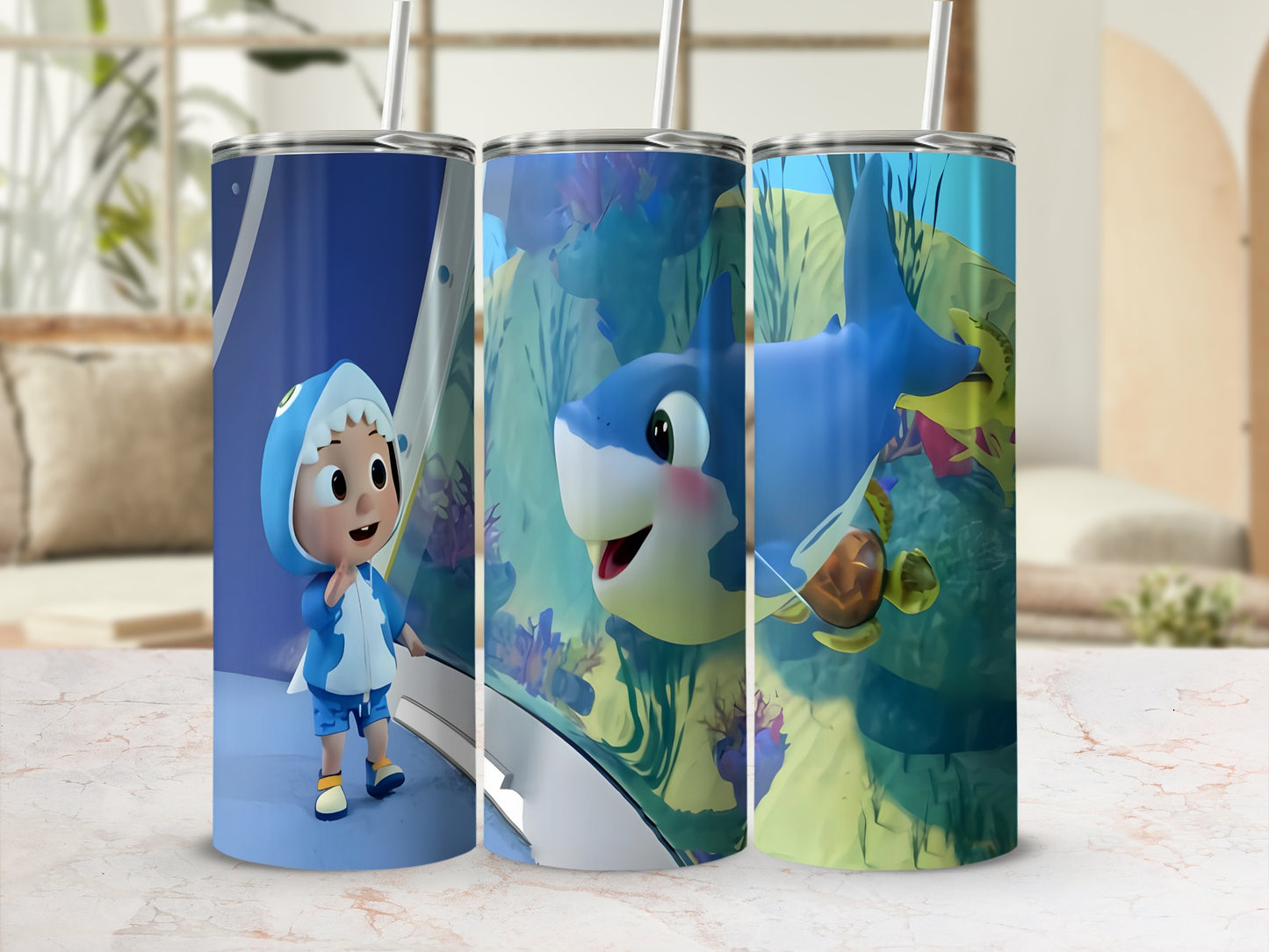 Three tumblers feature cartoon sharks and sea creatures in underwater scenes.