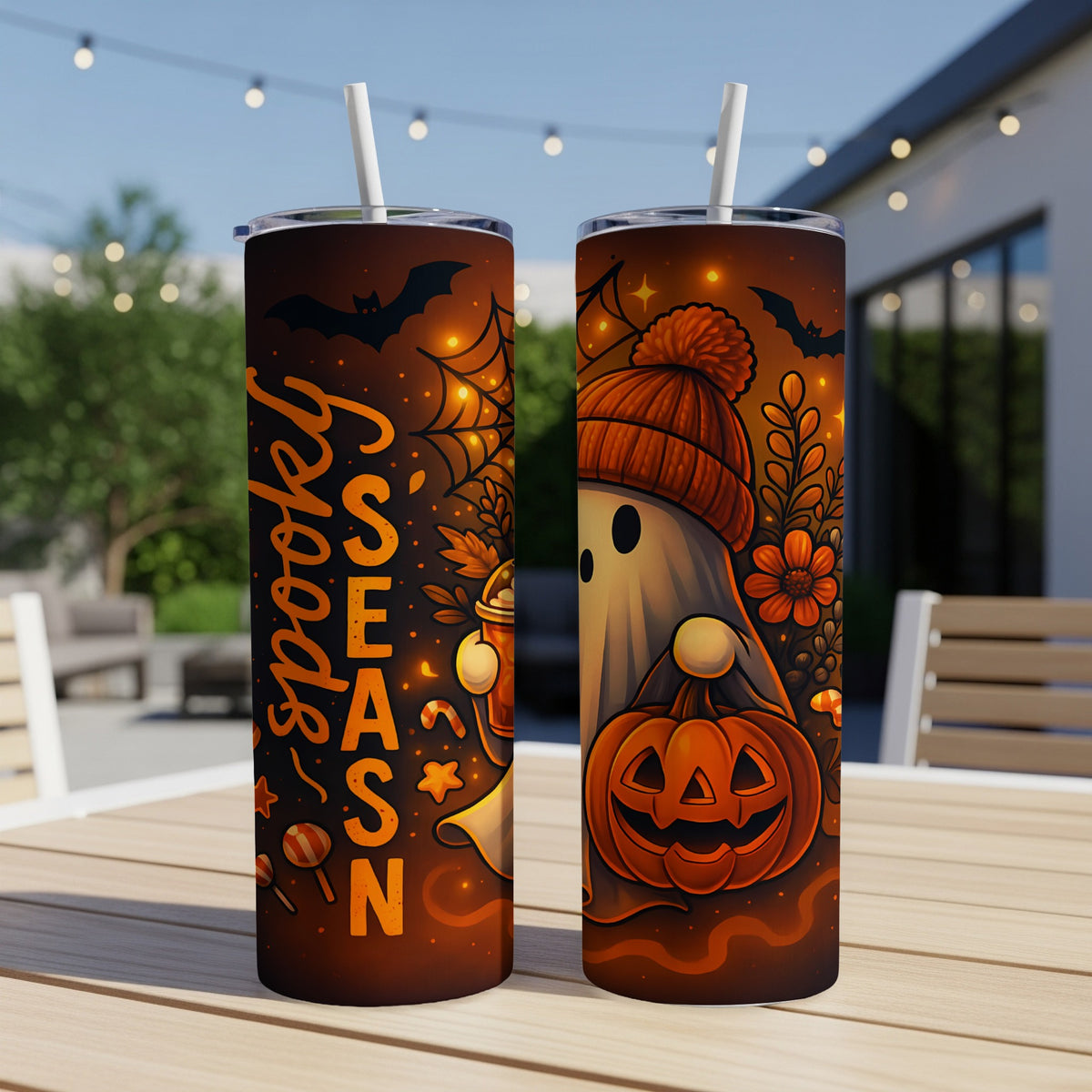 Two Halloween tumblers featuring a ghost with a pumpkin and "spooky season" text.