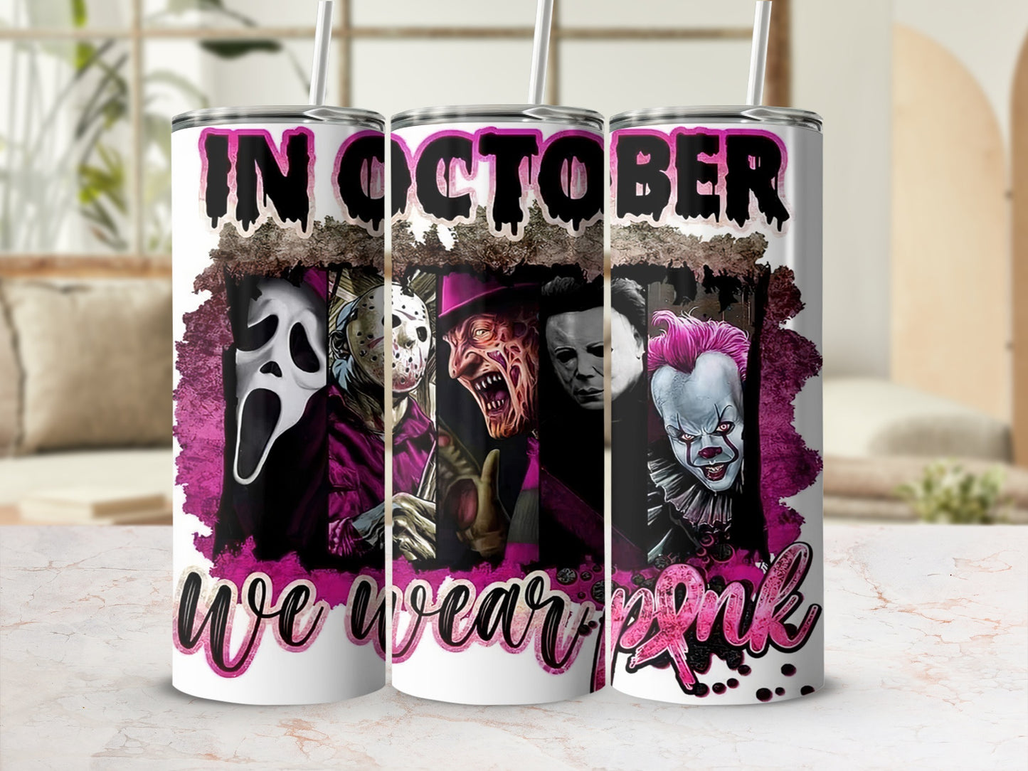 Horror movie characters in "In October We Wear Pink" tumbler design.