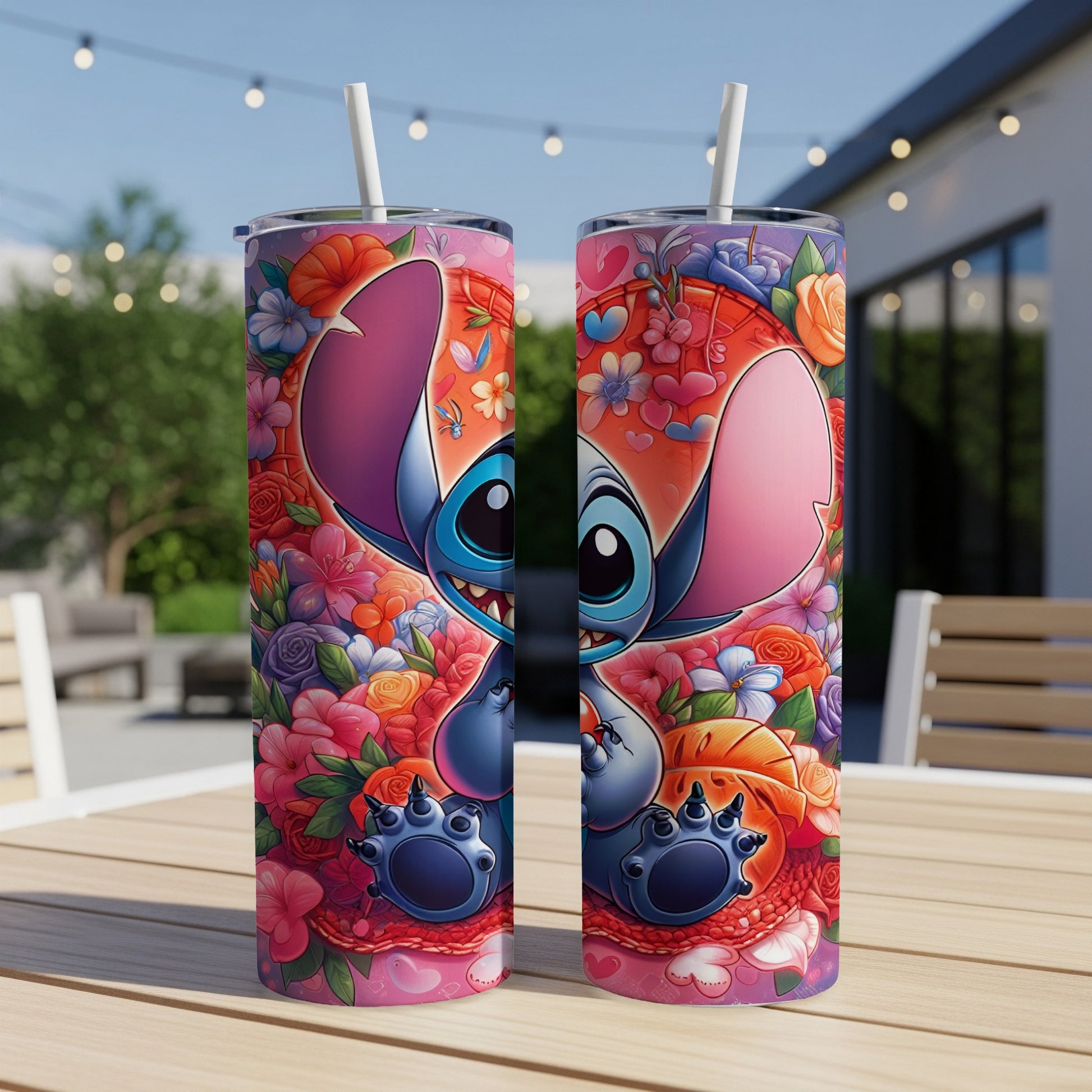 Stitch with heart-shaped flowers and swirls on a tumbler with a straw.