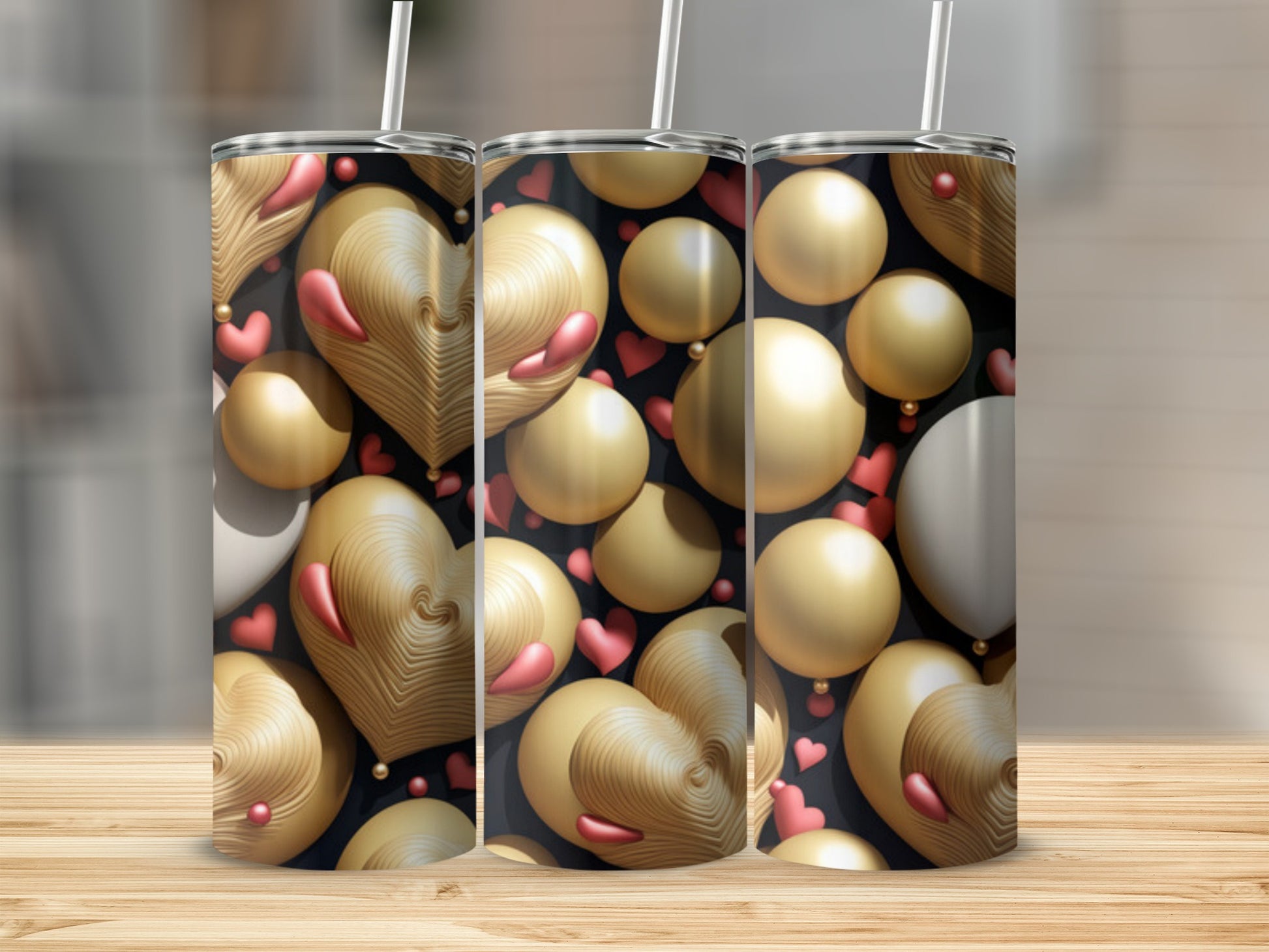 Three tumblers with gold spheres and wood-textured hearts pattern.