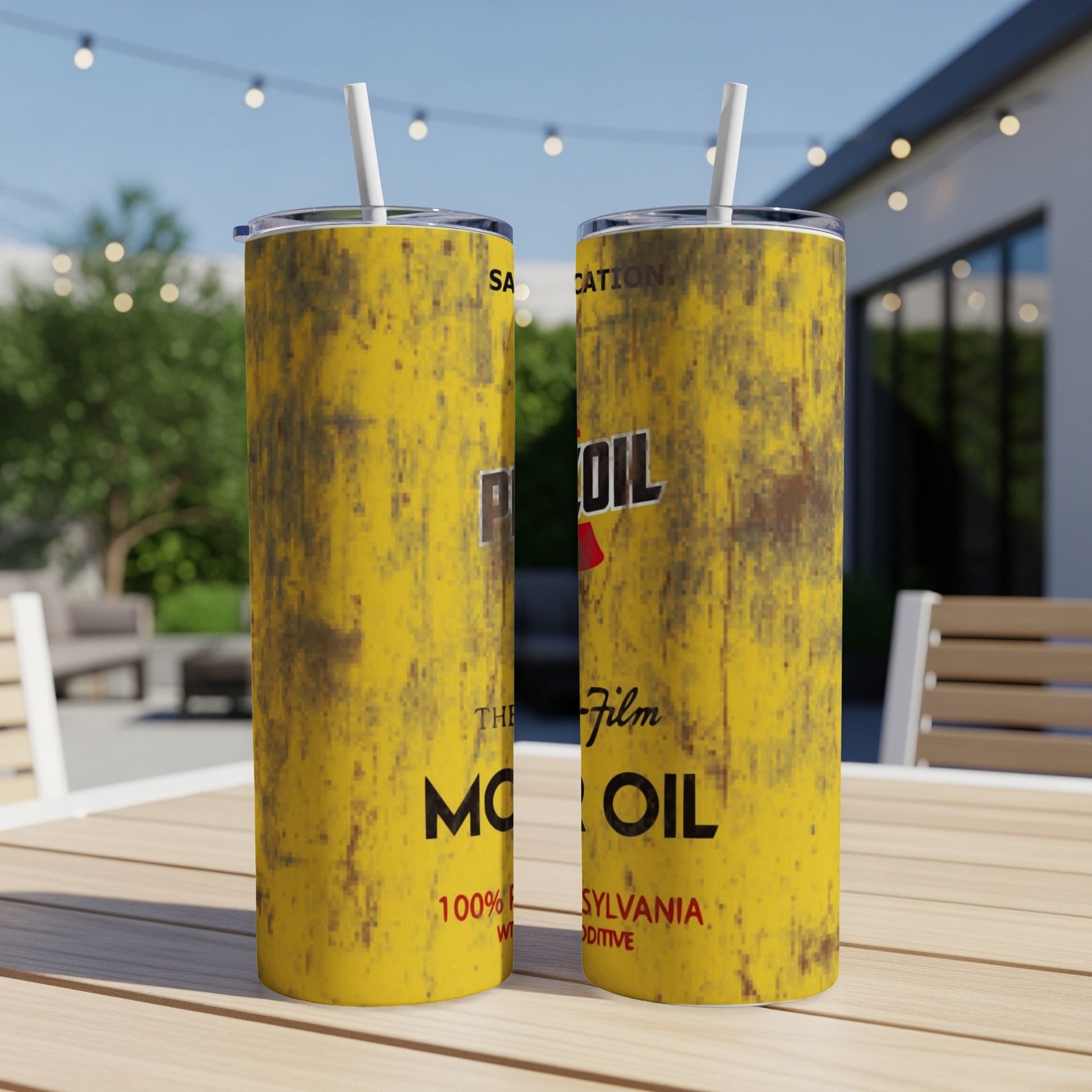 Yellow tumbler with "Red Ball Motor Oil" logo and weathered texture.