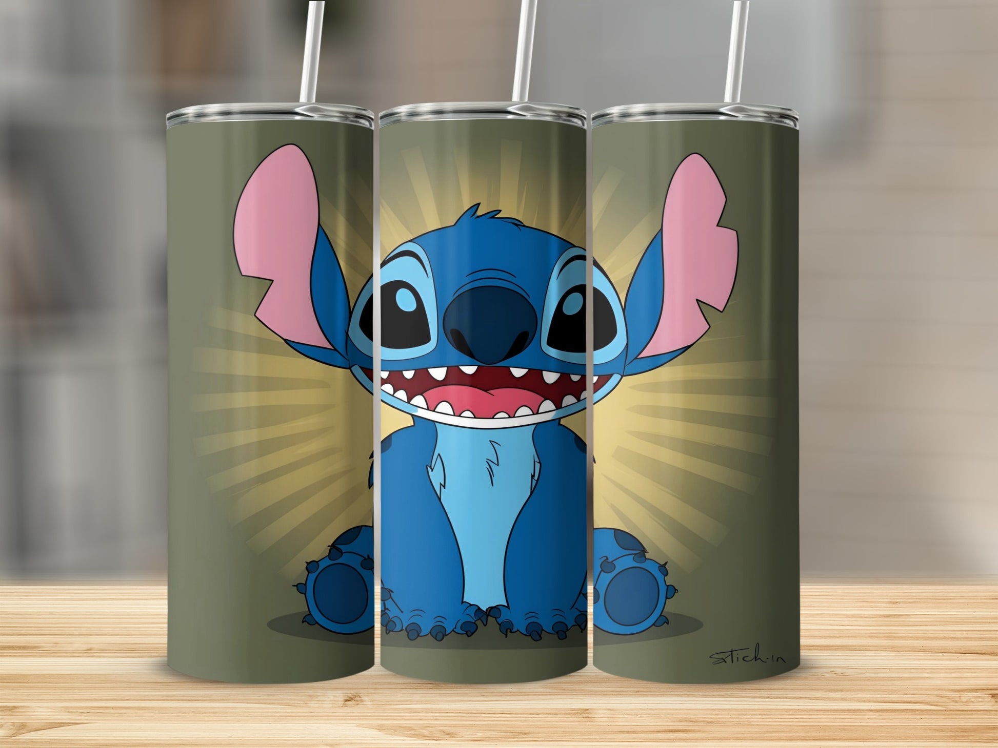 Blue Stitch character with wide smile on three tall tumblers.