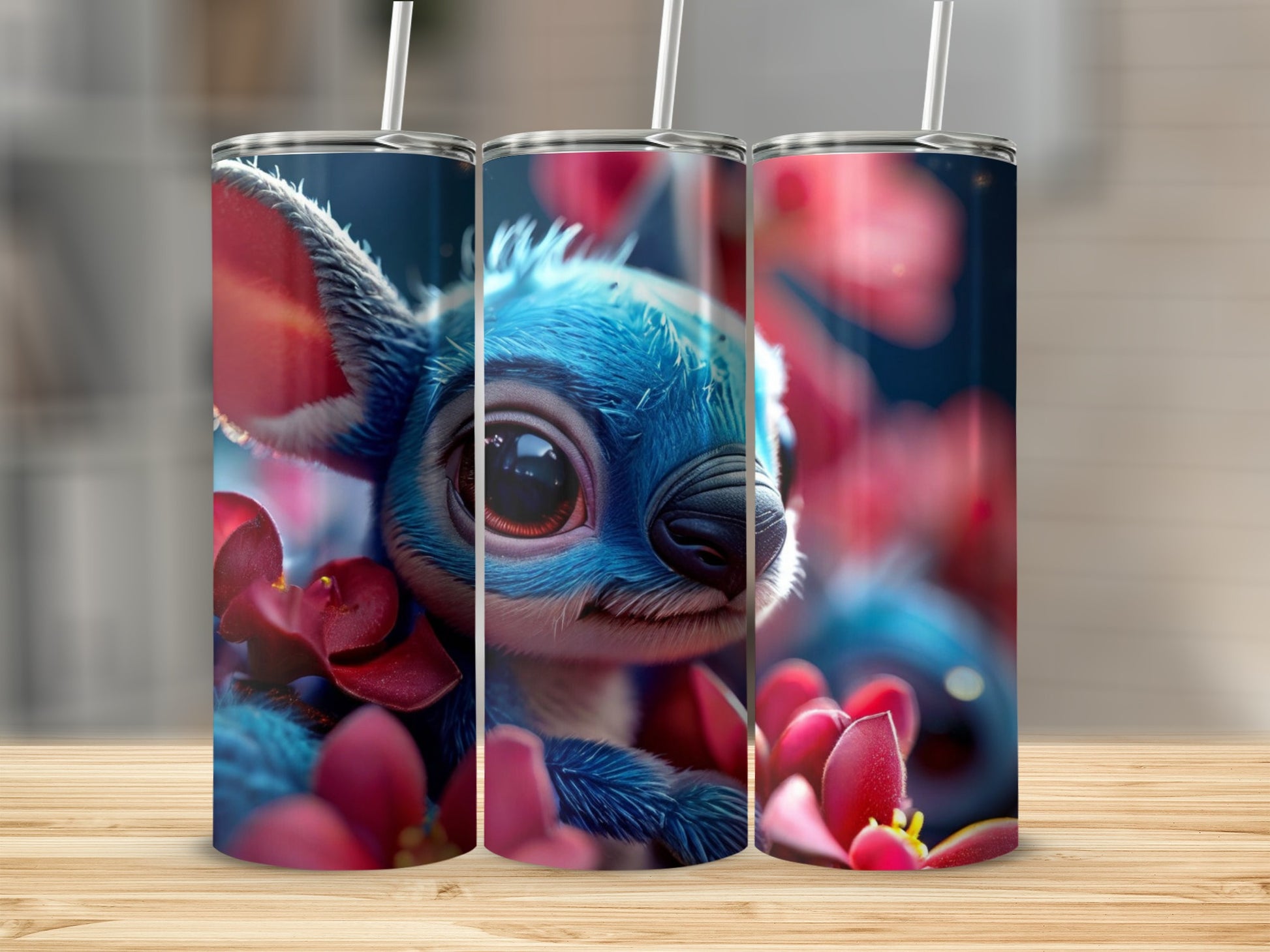 Blue alien character with big eyes and red flowers on a tumbler.