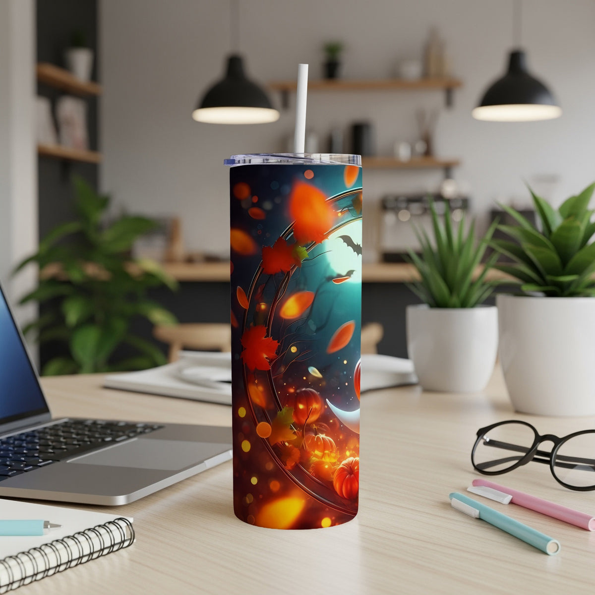 Tumbler with a Halloween-themed design featuring pumpkins, bats, and autumn leaves.