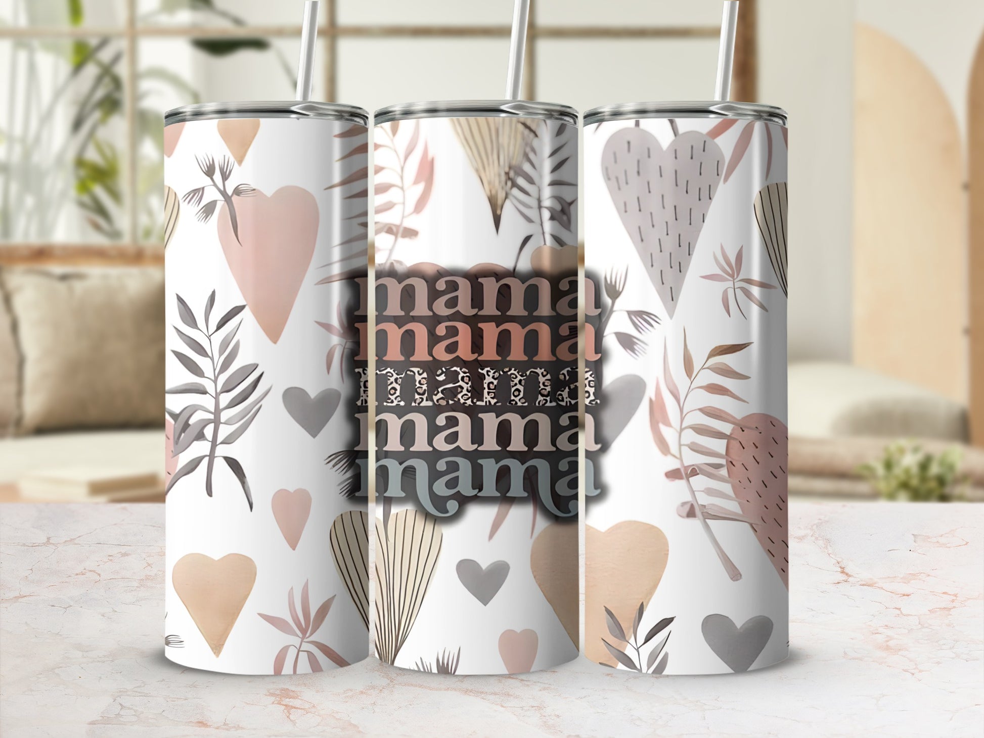 Mama tumbler with hearts and floral designs.