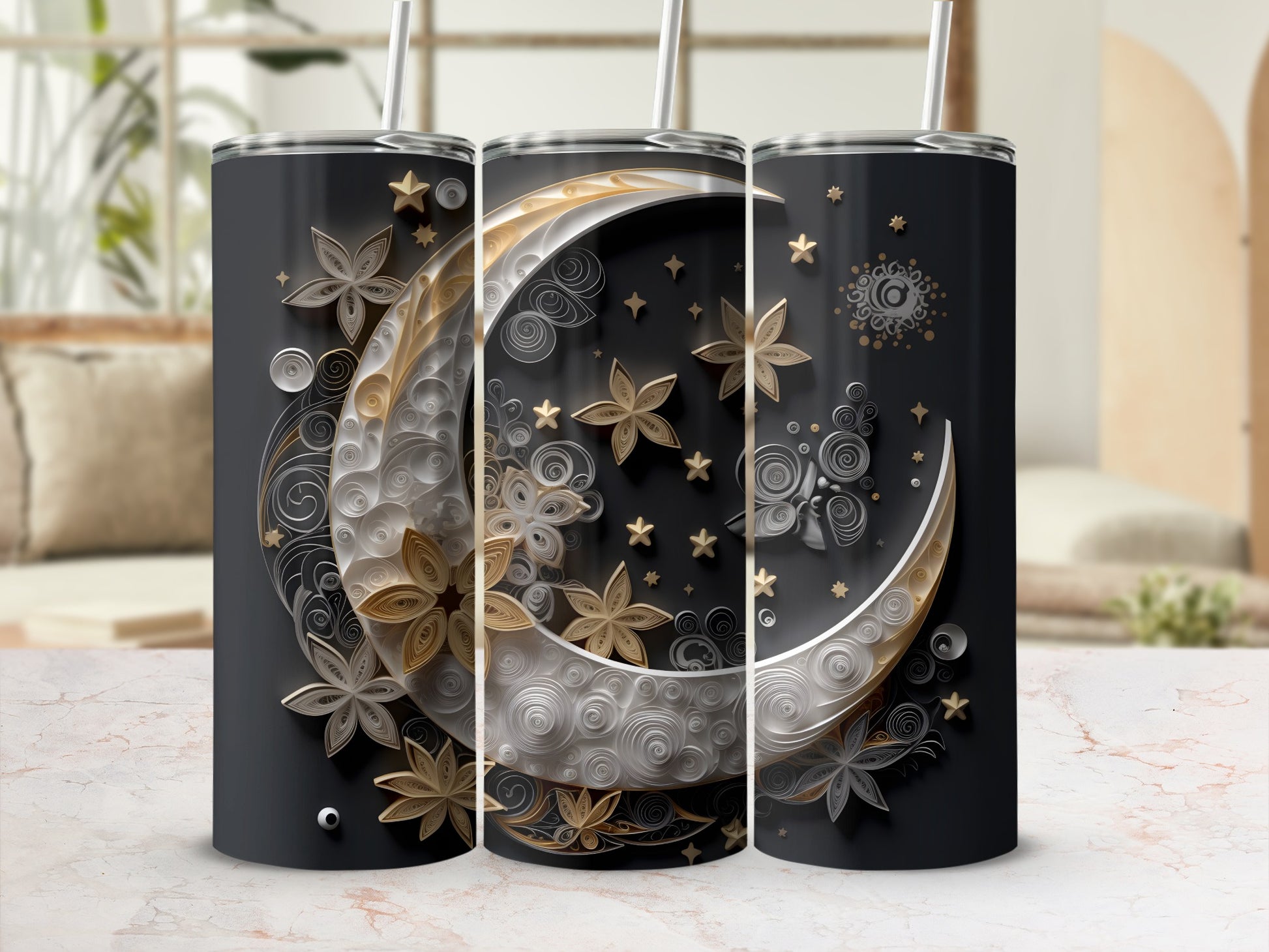 Three dark tumblers with celestial moon and star designs.