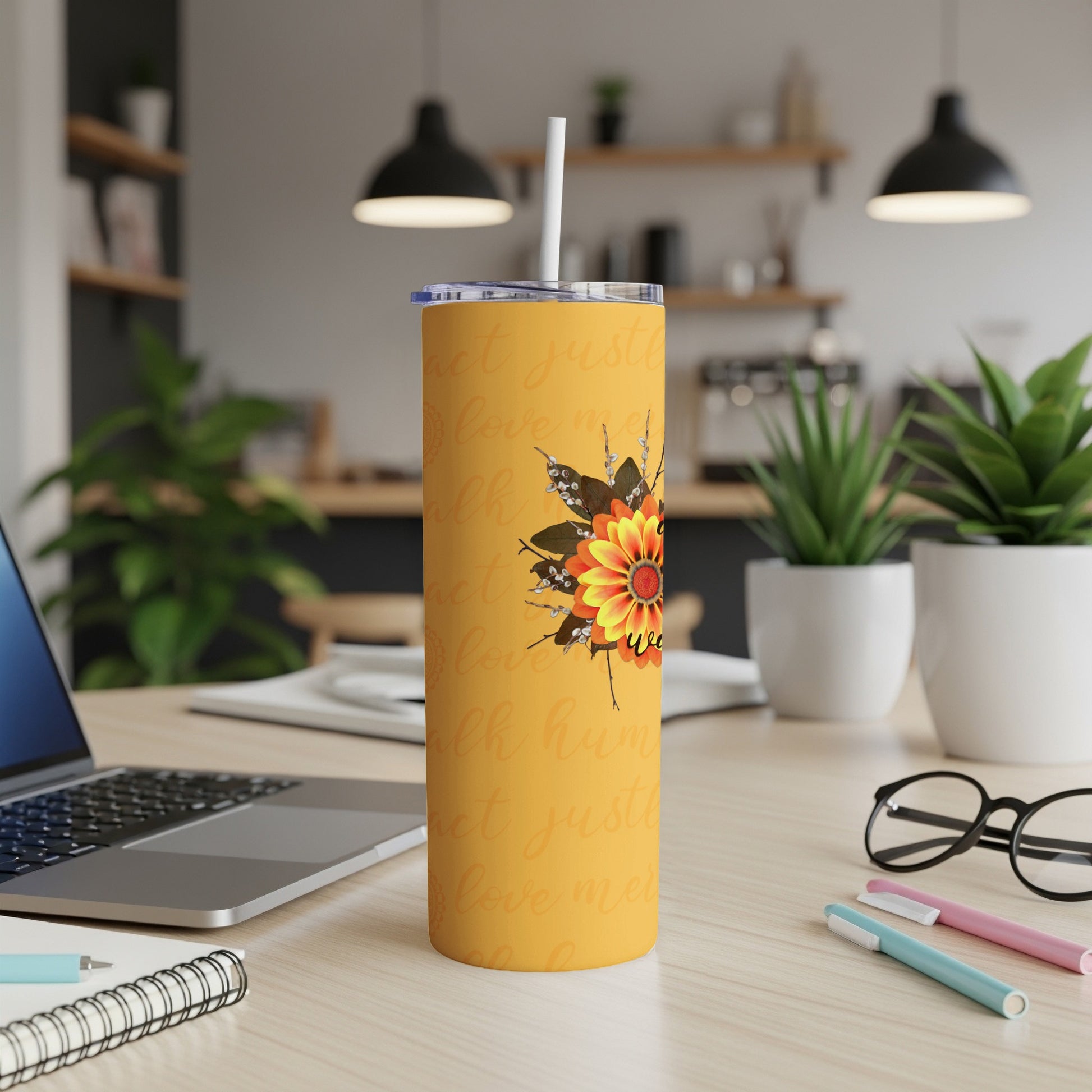 Yellow tumbler with sunflower and inspirational text.