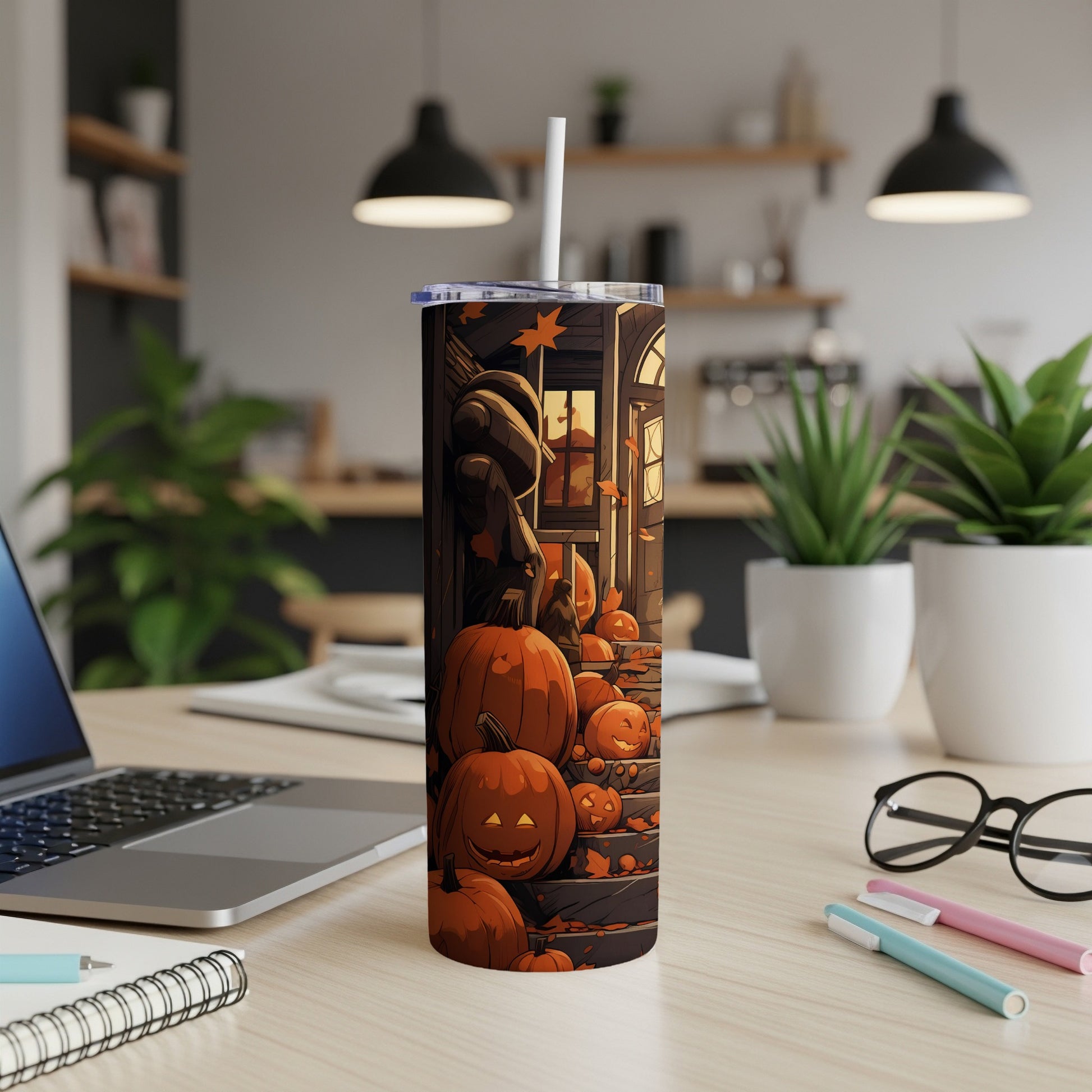 Tumbler with Halloween pumpkins and falling leaves illustration.