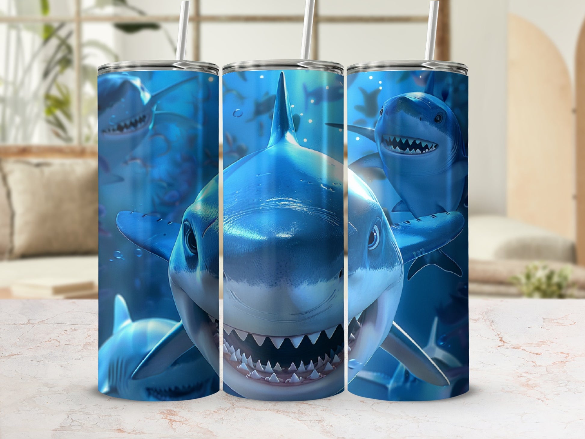 Three tumblers with close-up shark graphics on a marble surface.