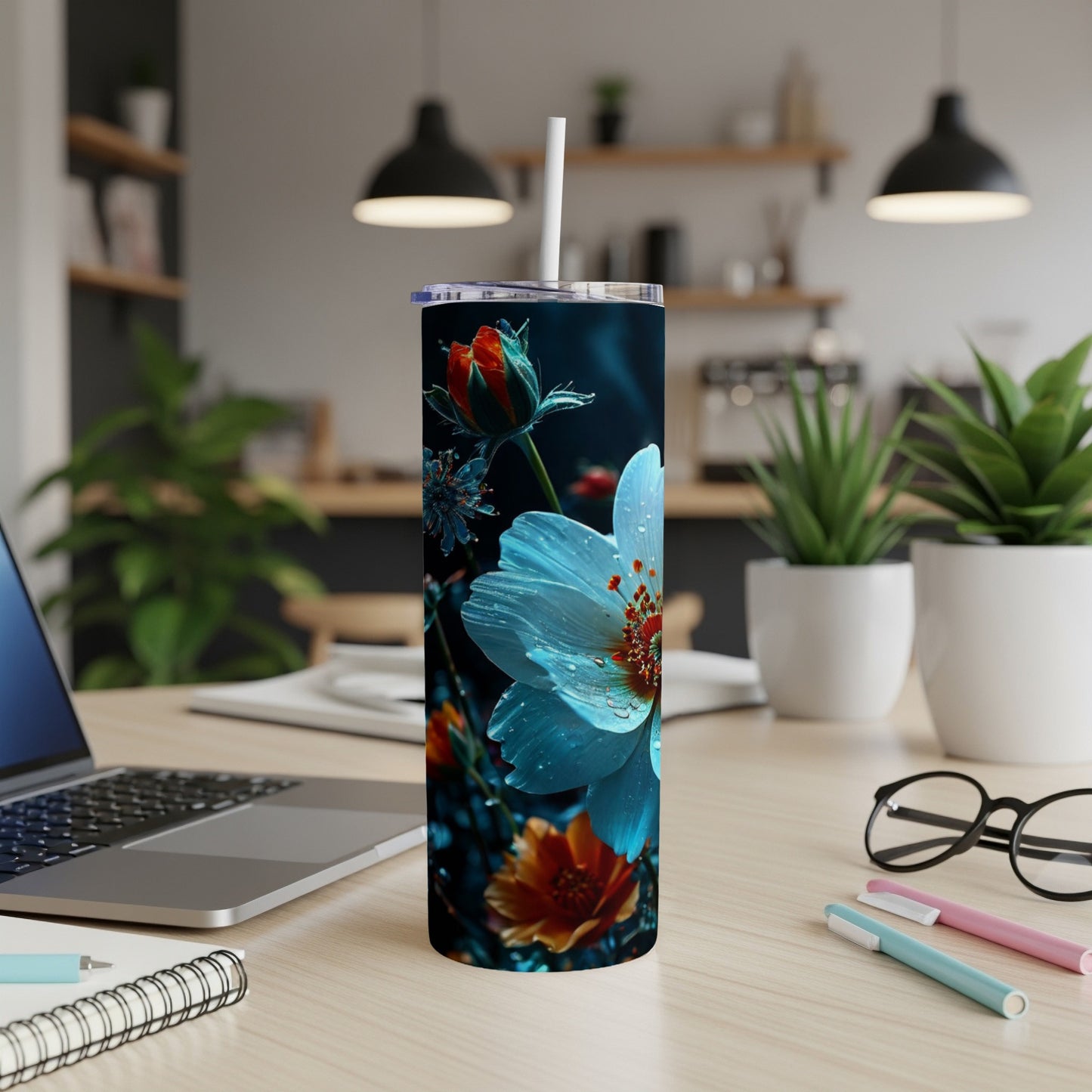 White and orange flowers on a dark background on a tumbler.