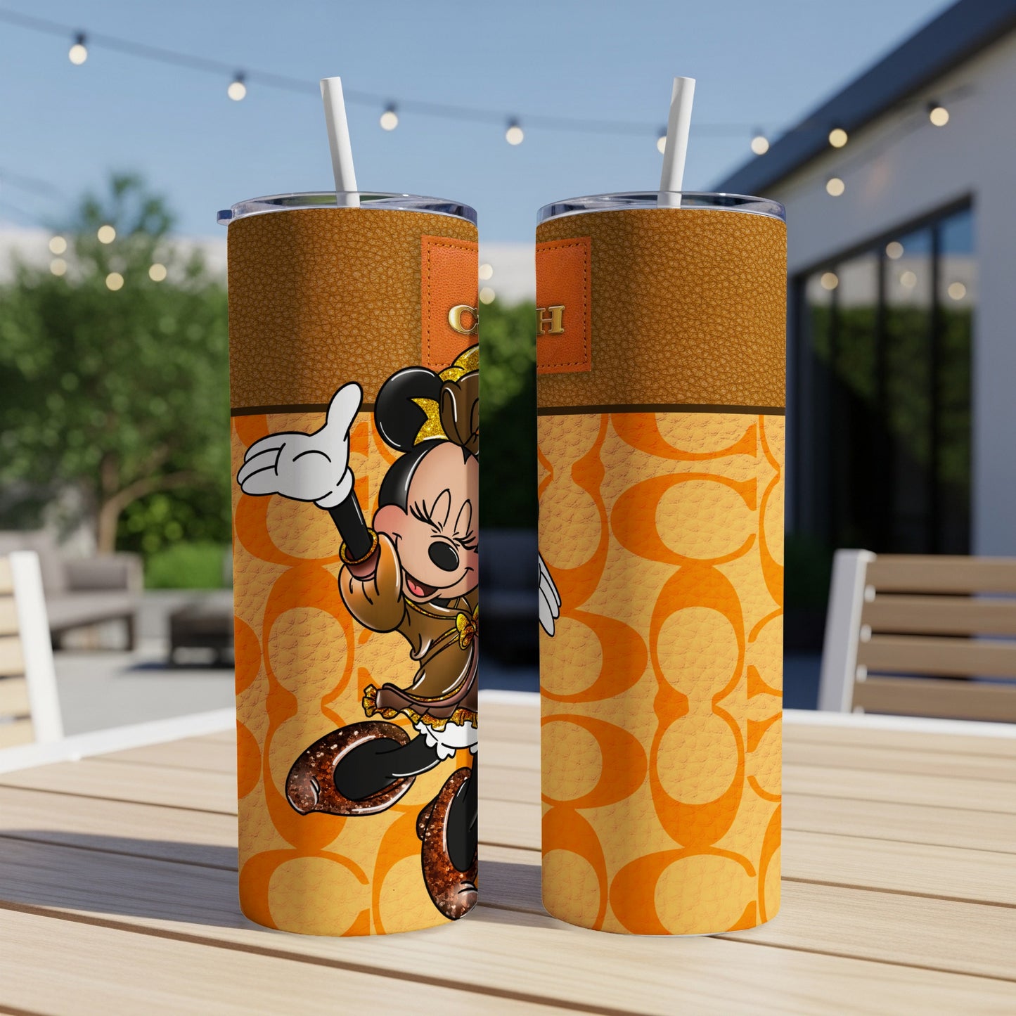 Minnie Mouse on a tumbler with Coach pattern and logo.