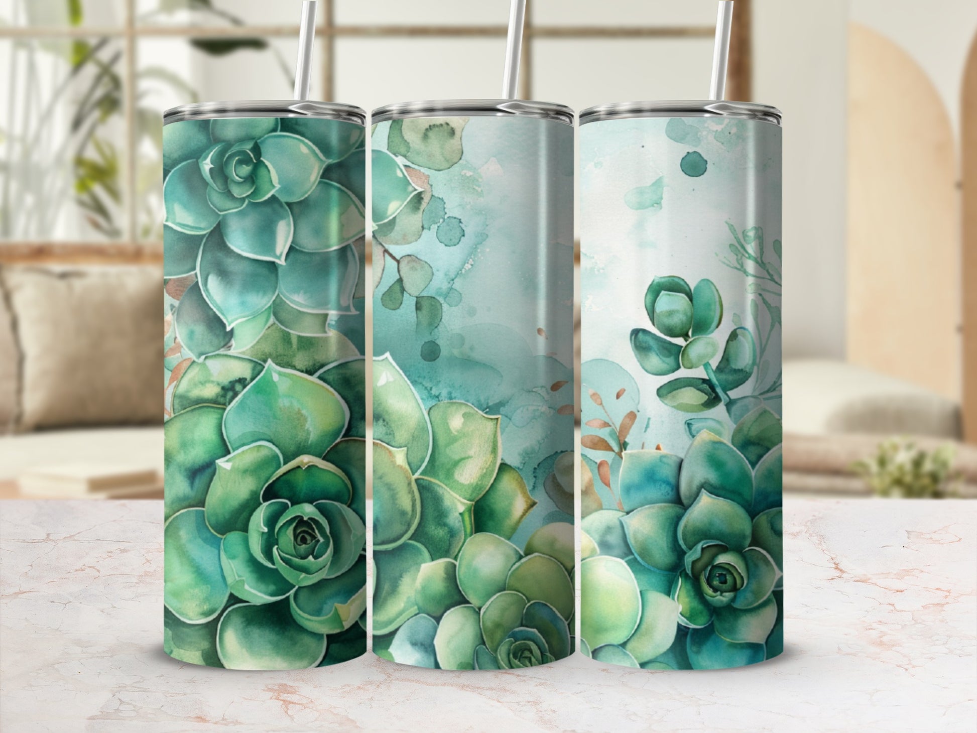 Three tumblers with a watercolor succulent design.