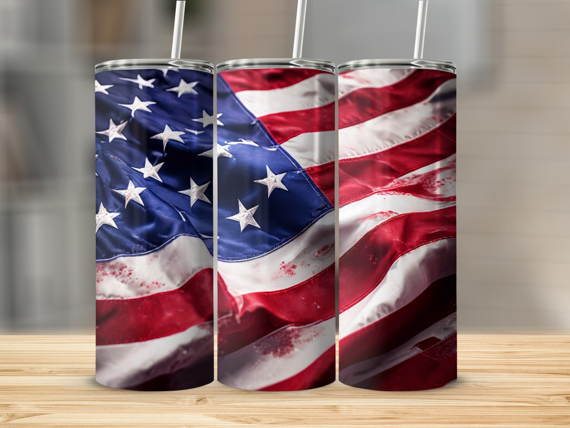 Three tumblers decorated with the American flag design.