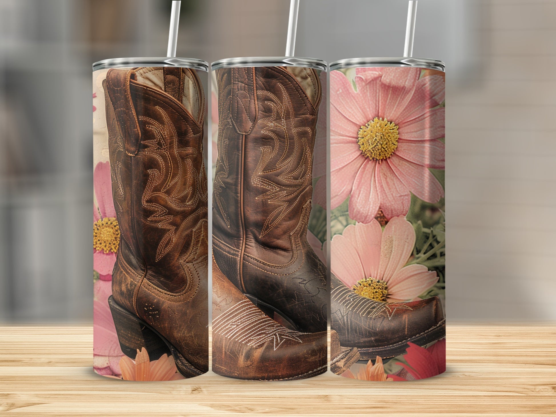 Cowboy boots and pink flowers design on a tumbler.