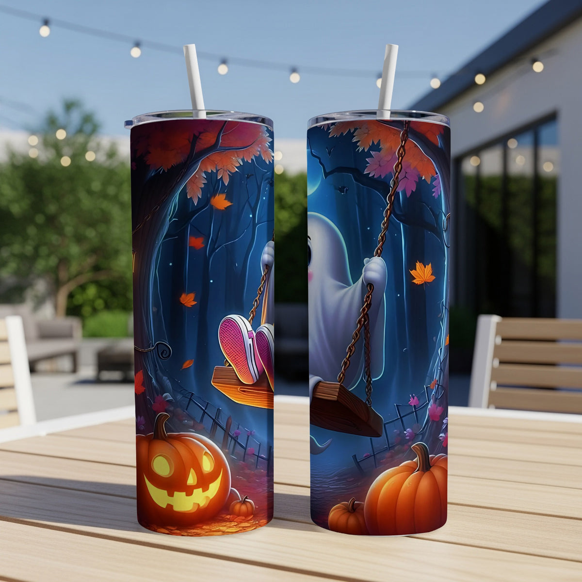 Two tumblers featuring a ghost on a swing surrounded by pumpkins and autumn leaves.