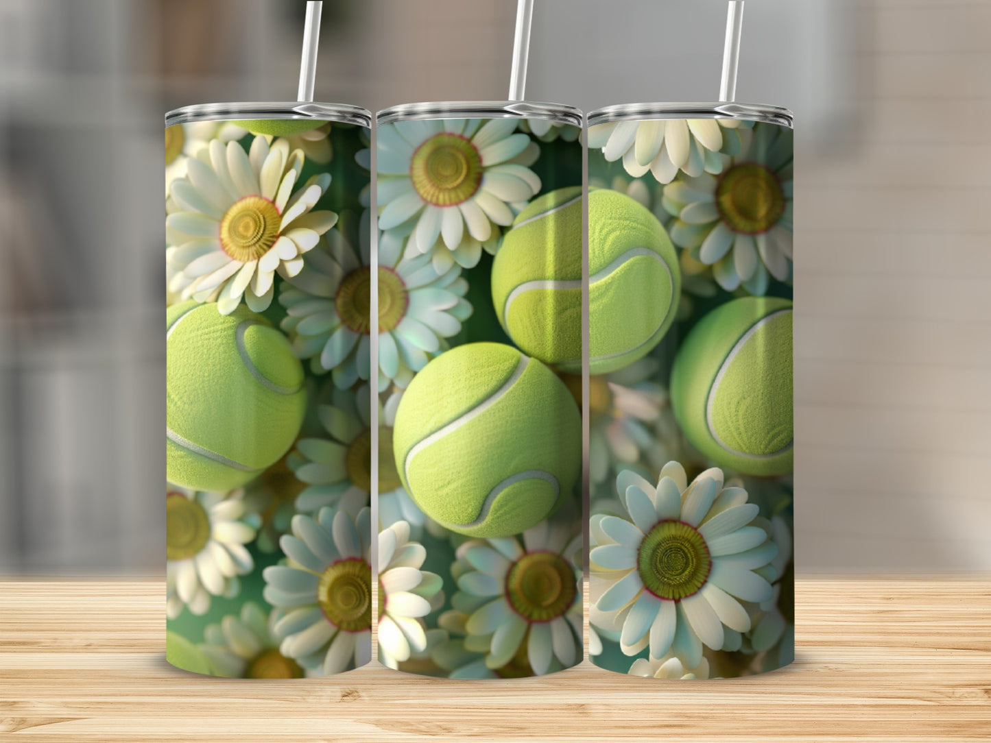 Three tumblers with tennis balls and daisies on a wooden surface.