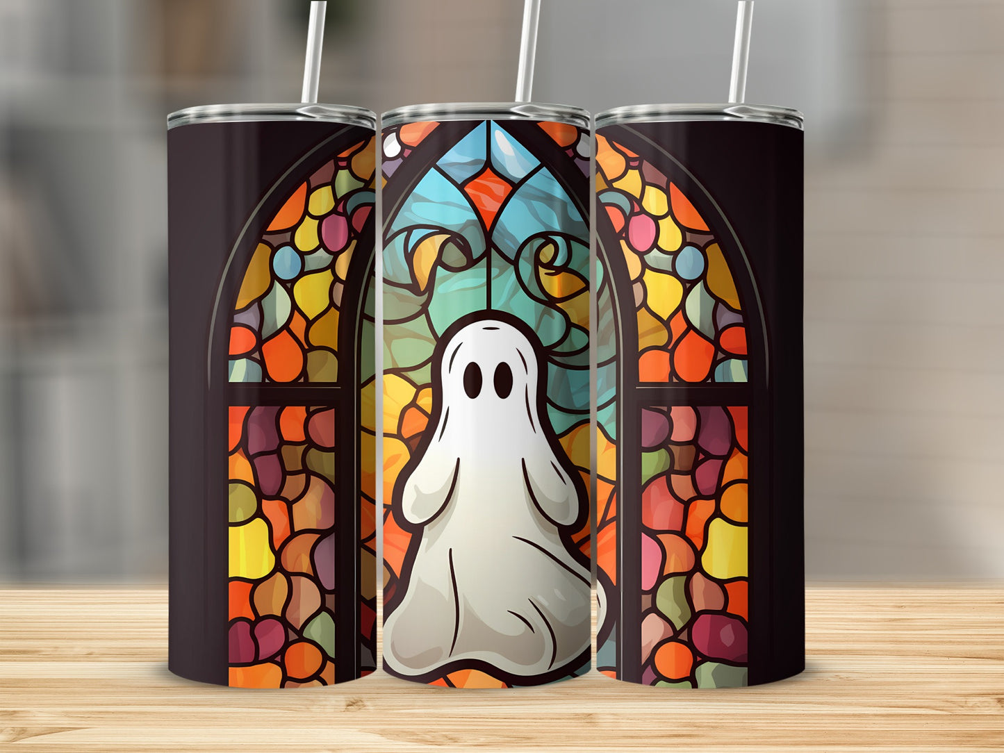 Ghost in stained glass window design on three tumblers.