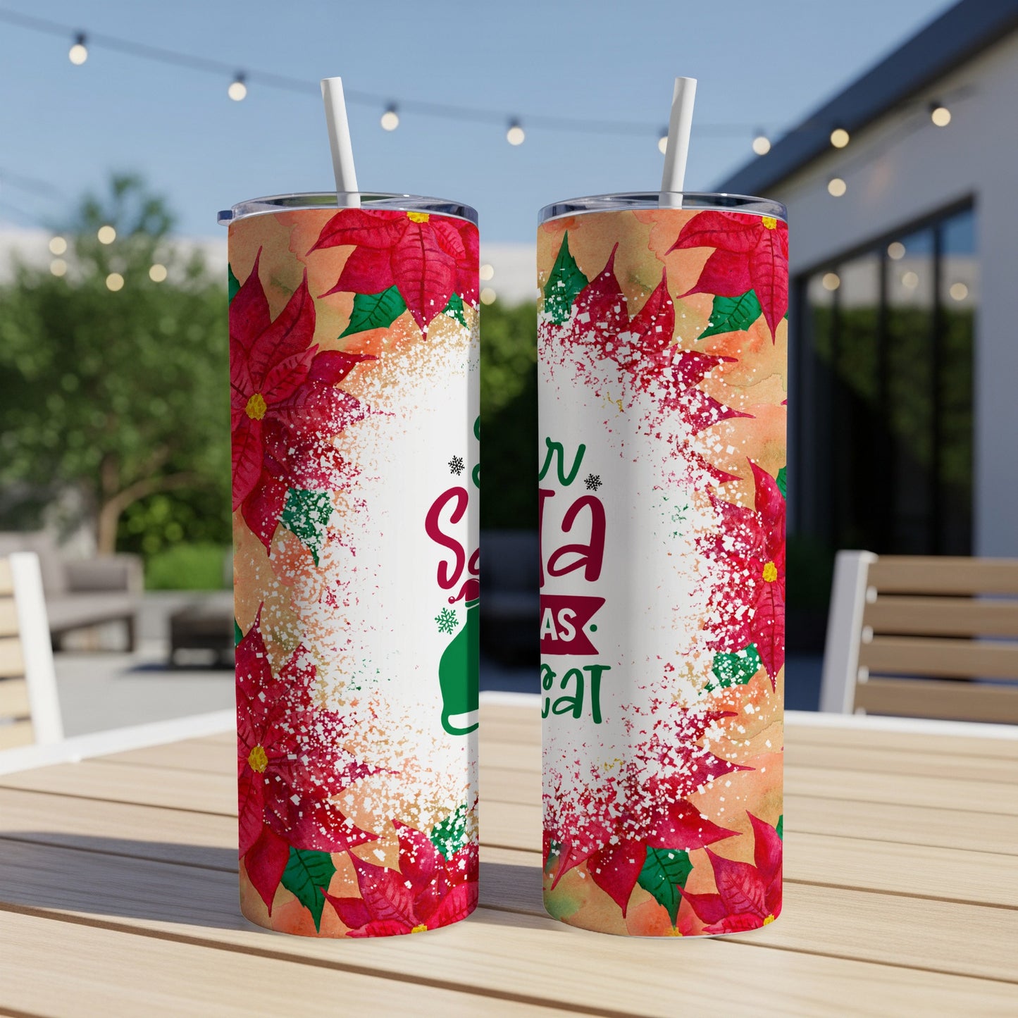 Two Santa Cat tumblers with poinsettia and glitter design.