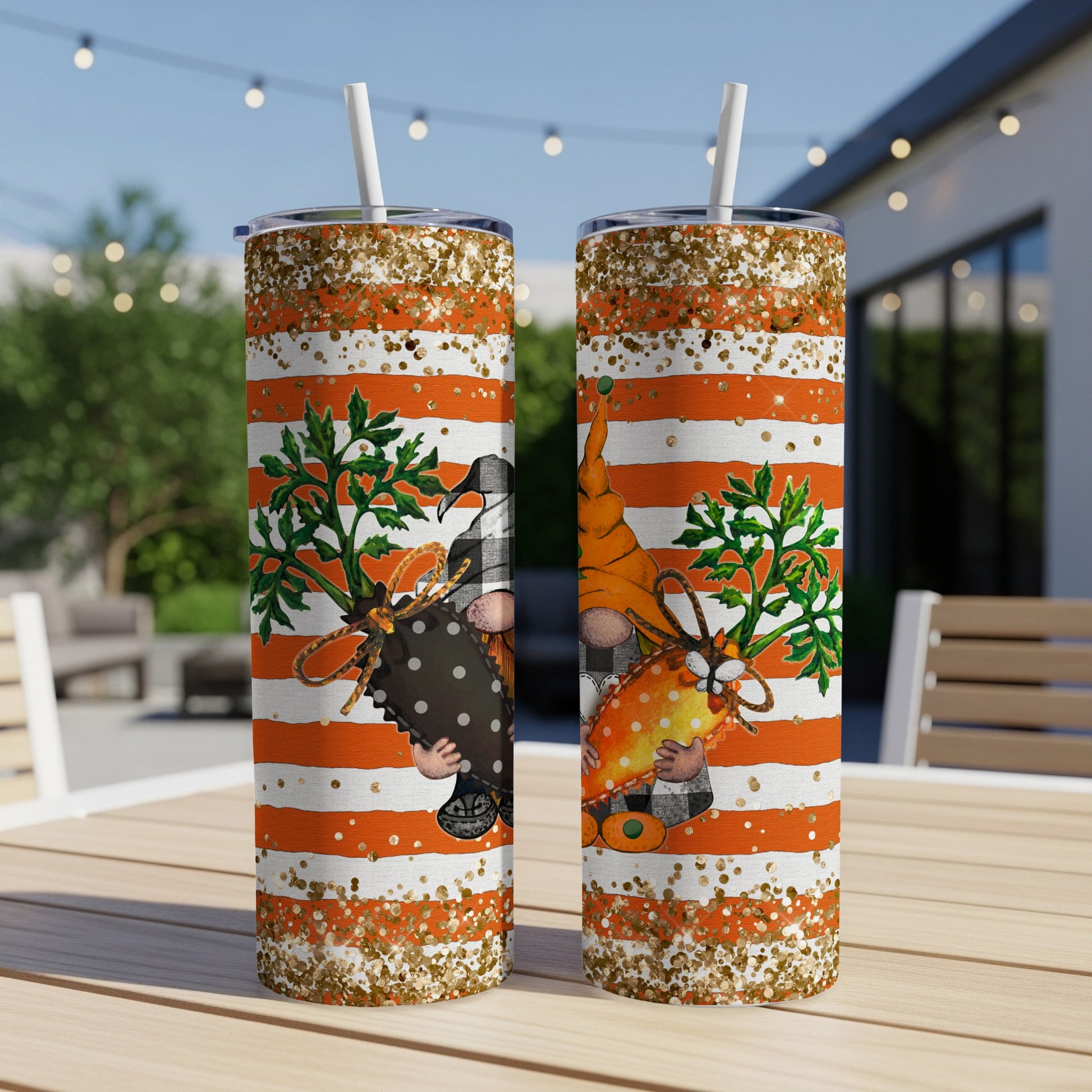 Two tumblers with striped patterns and gnome graphics with carrots.