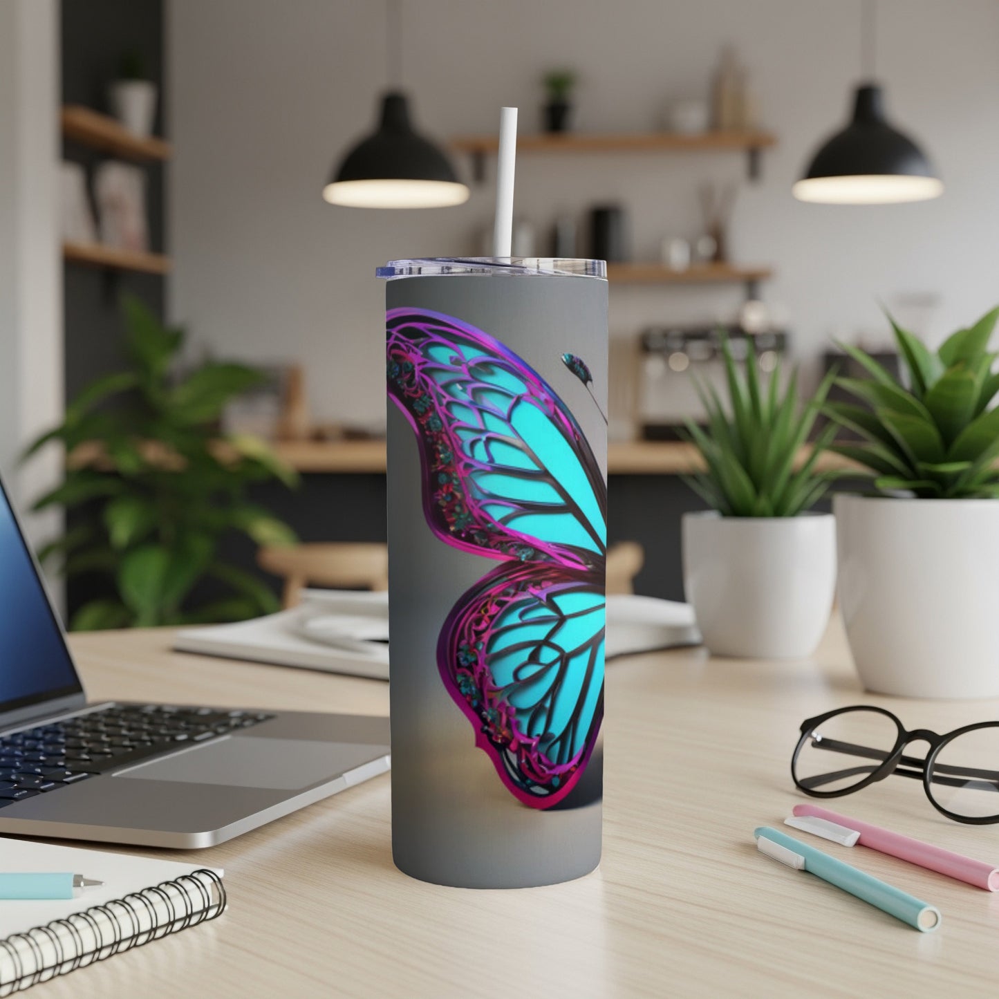 Tumbler with a vibrant blue and purple butterfly design.