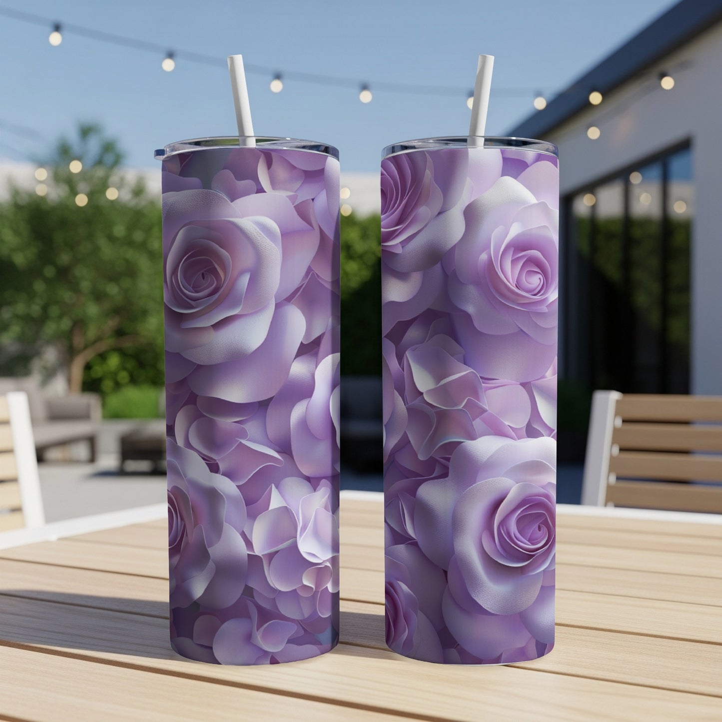 Two tumblers adorned with a dense pattern of purple and pink rose blossoms.