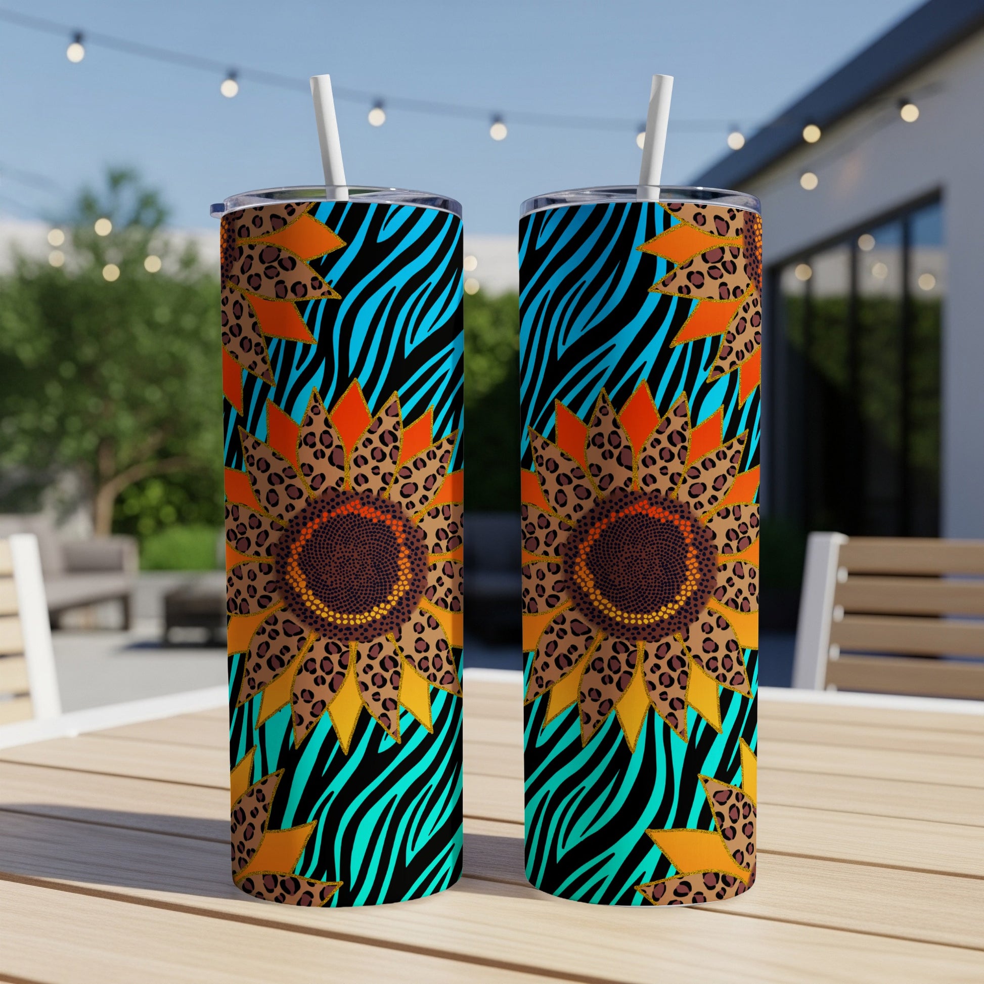 Two patterned tumblers with sunflowers, leopard print, and zebra stripes.