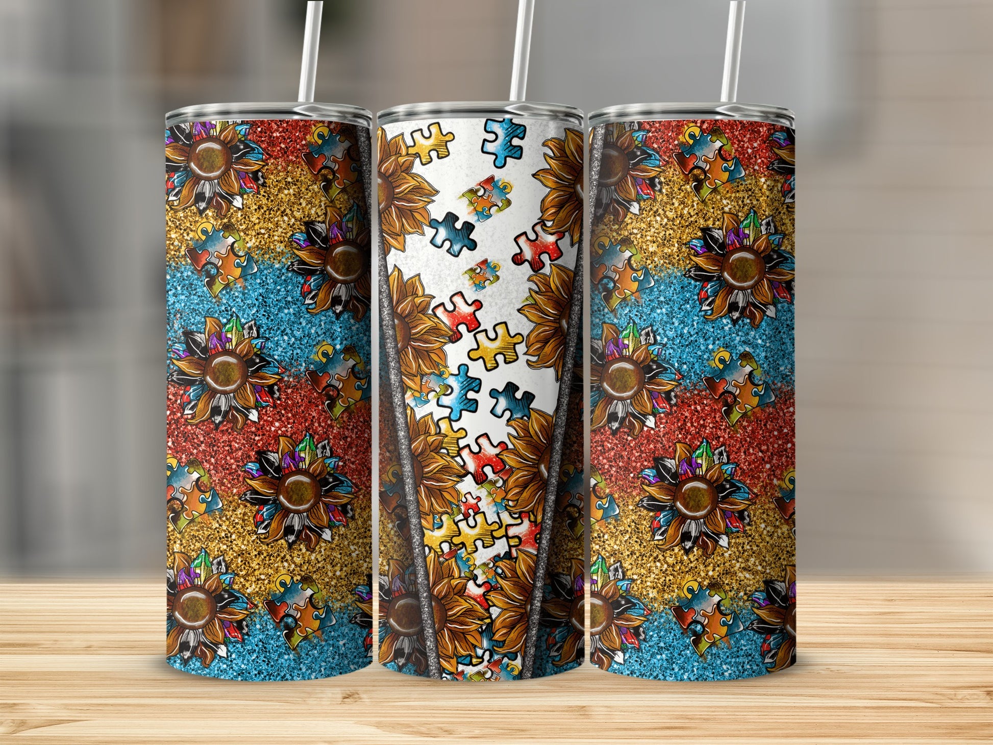 Three tumblers with autism awareness puzzle piece and sunflower patterns.