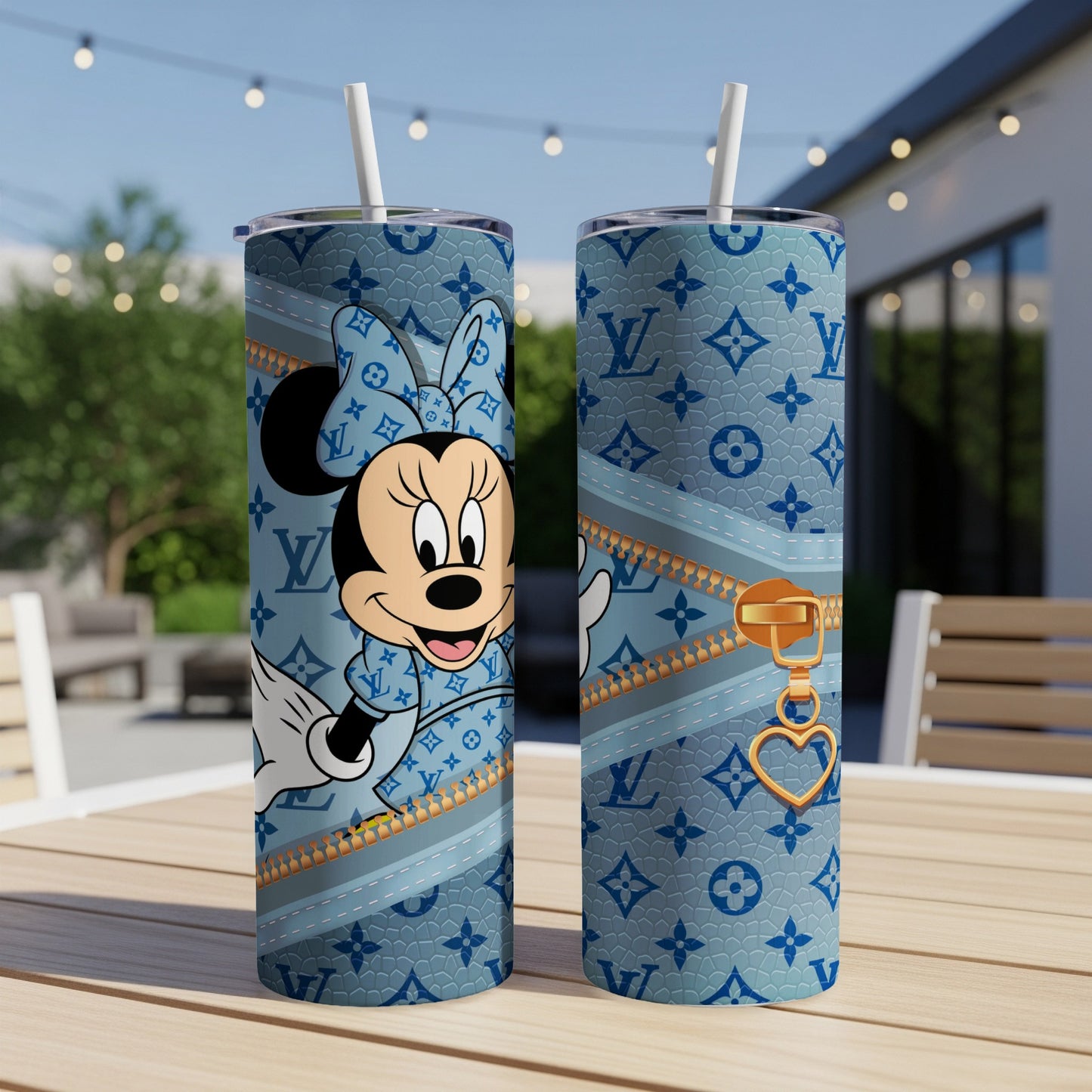 Minnie Mouse on blue patterned tumbler with gold zipper and heart charm.