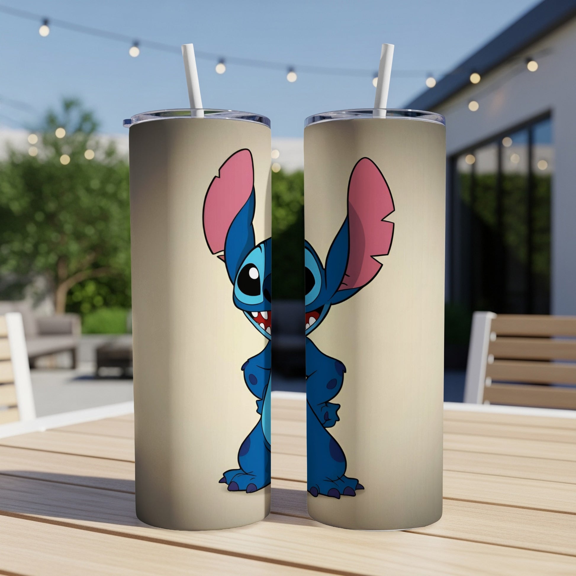 Two tumblers featuring a cartoon Stitch character in blue on a cream background.