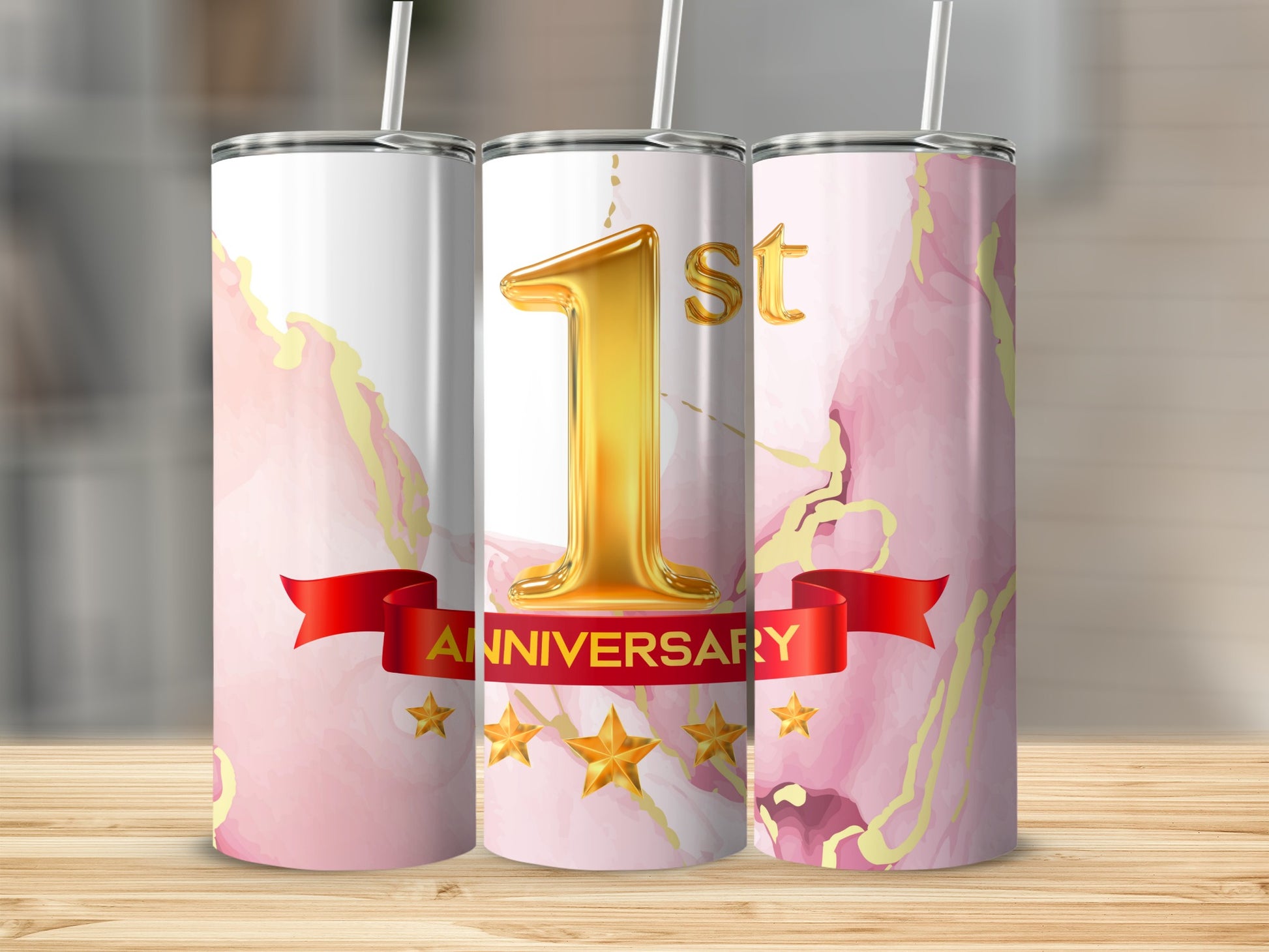 Gold "1st Anniversary" text on a pink marble tumbler with gold accents.