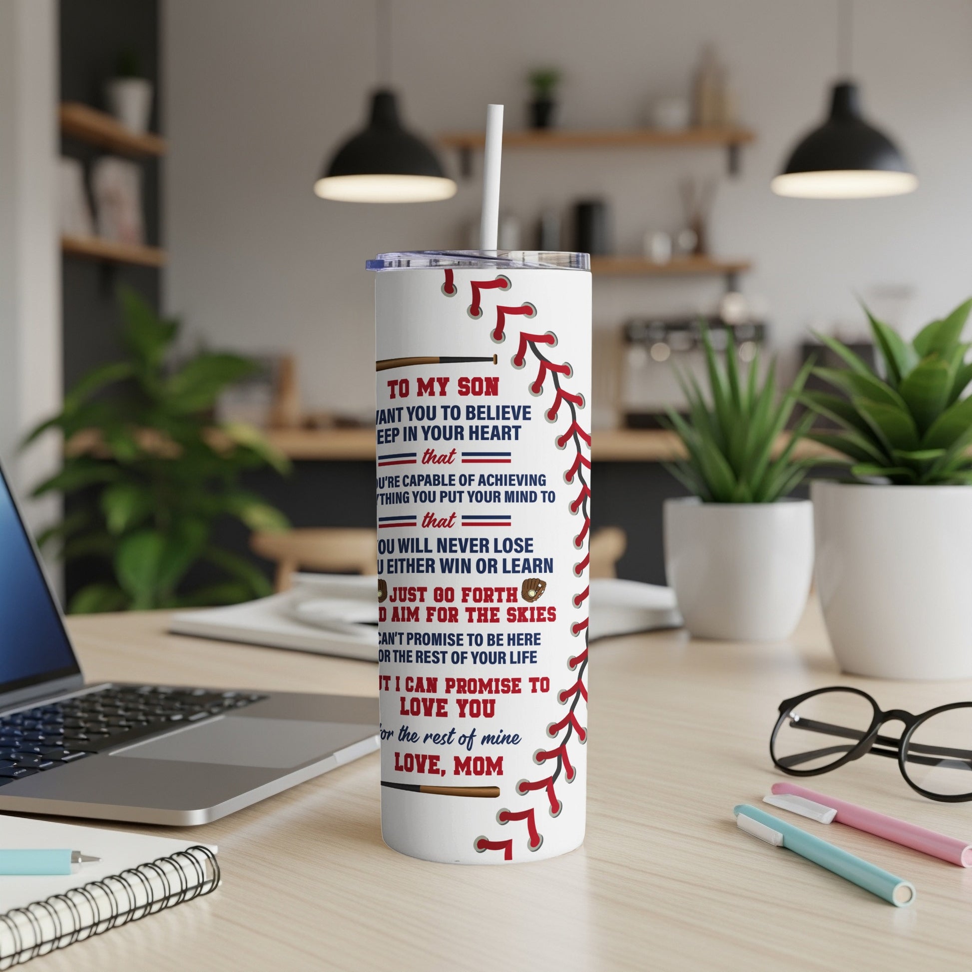 White tumbler with baseball stitching and inspirational message for son from mom.