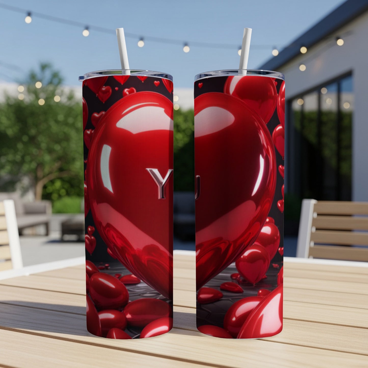 Red heart balloon with "YOU" on a wooden table with other heart shapes.