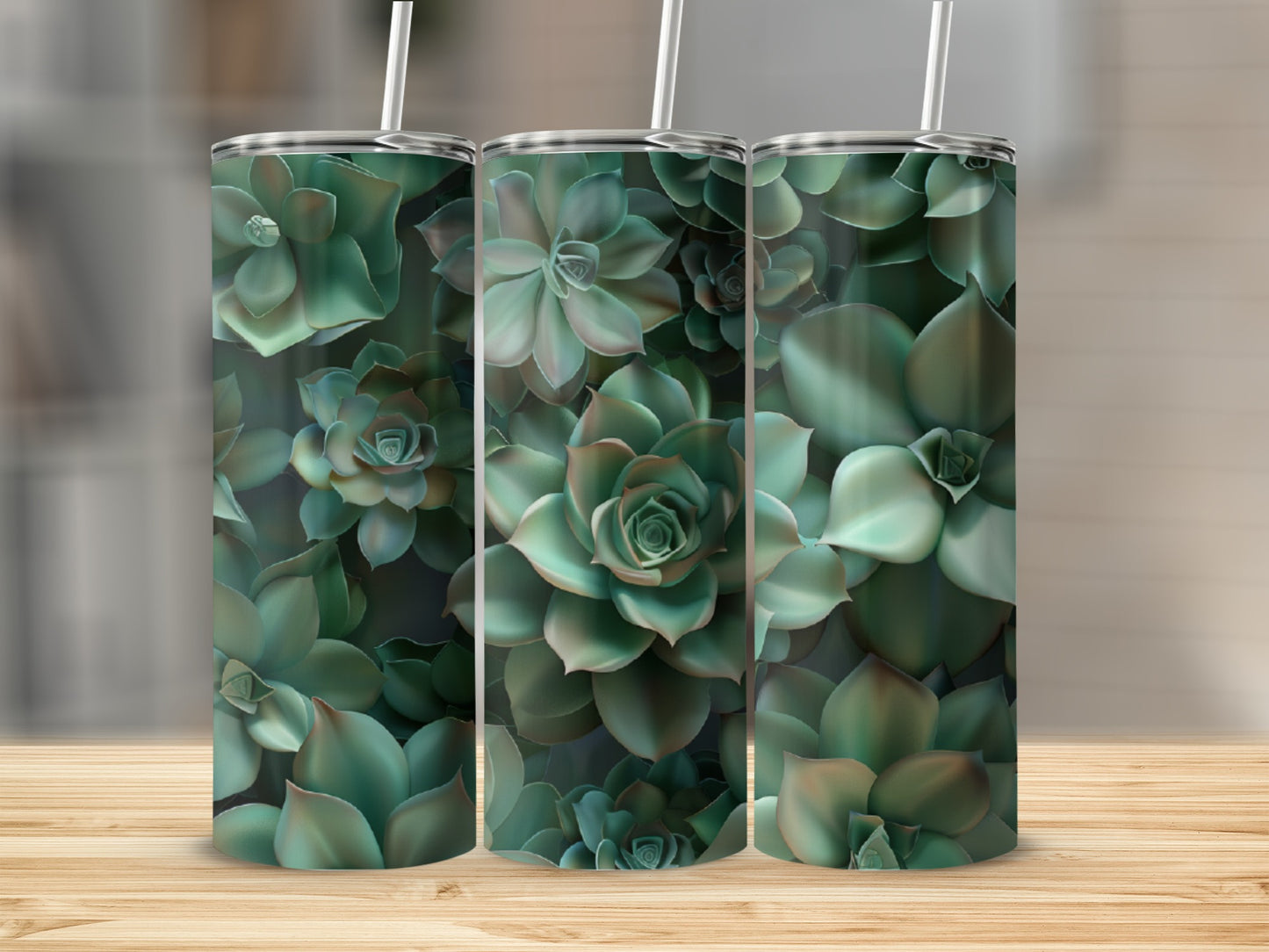Green succulents pattern on a tumbler with a straw.