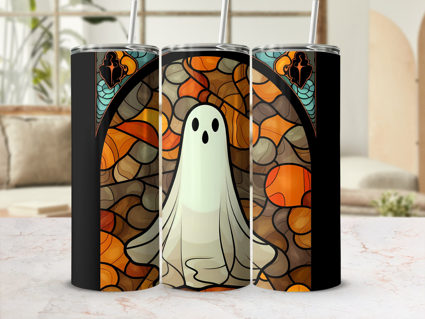 Ghost in stained glass pattern on a black tumbler with straw.