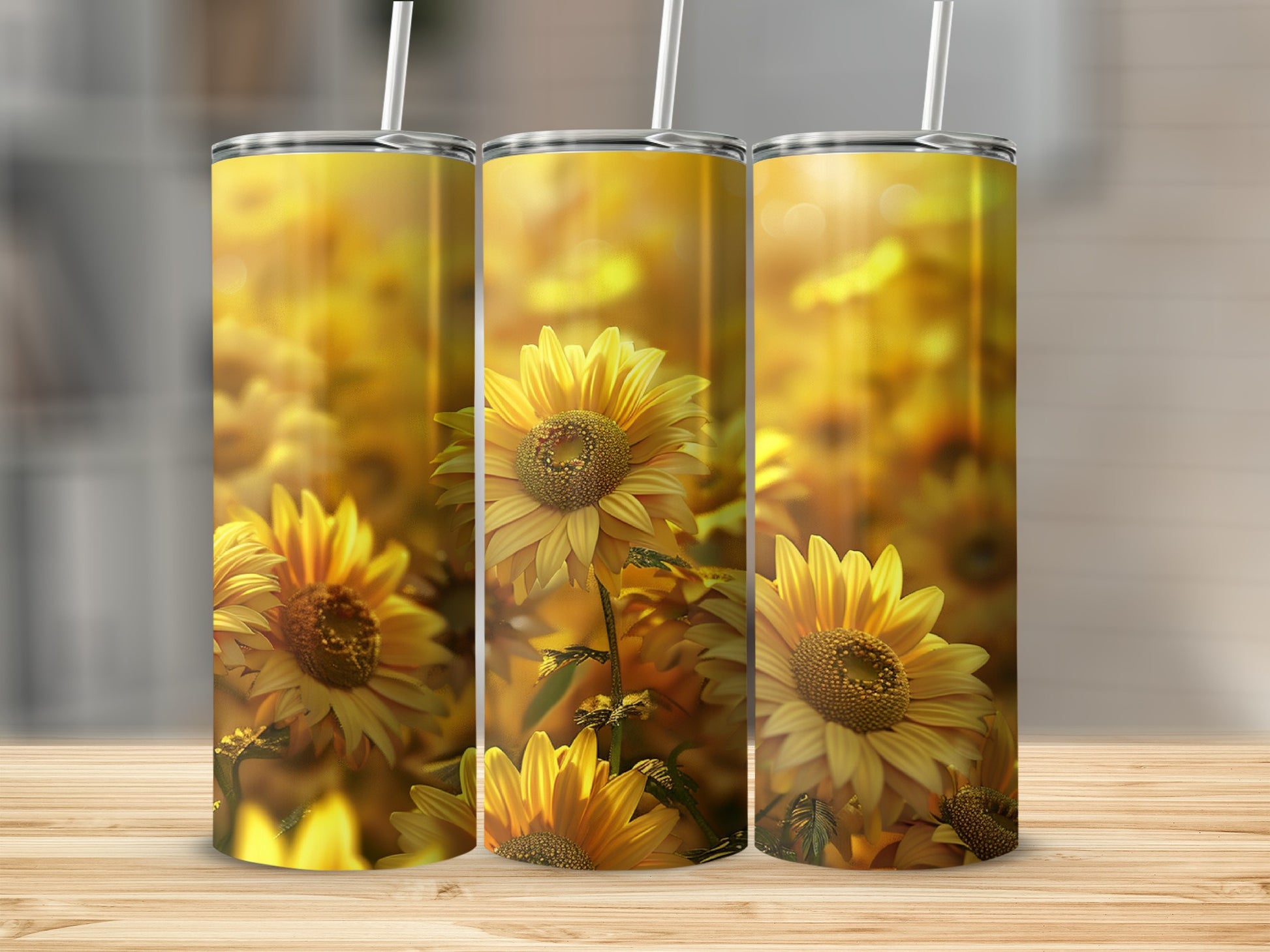 Three tumblers with a golden sunflower field design.