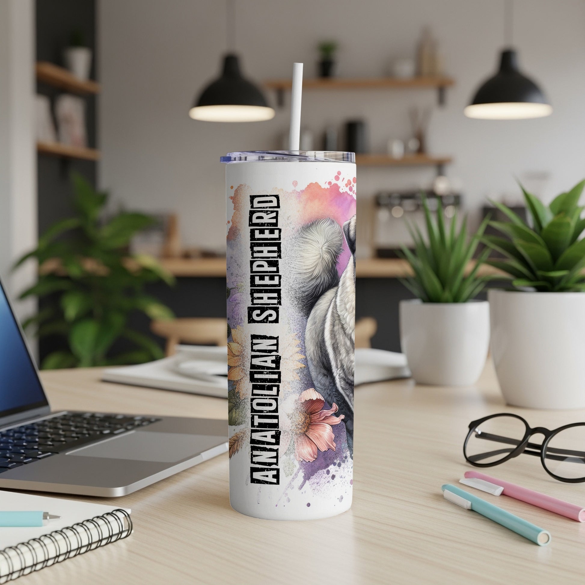 Tumbler with Anatolian Shepherd dog design and floral accents.