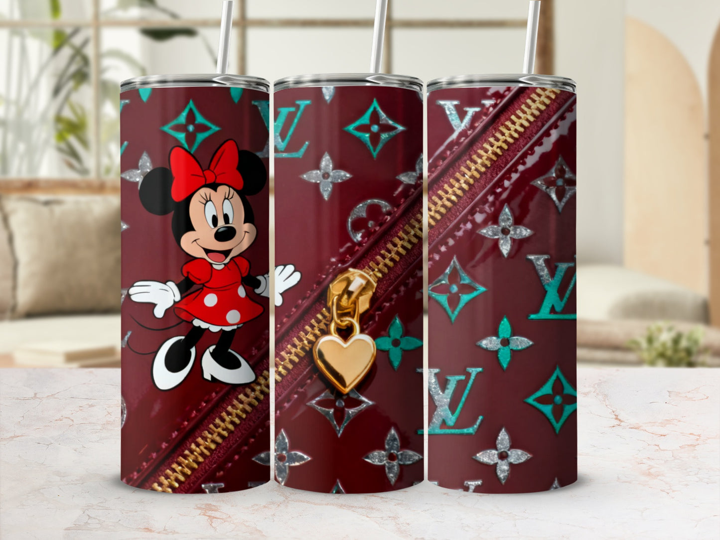 Maroon tumbler with Mickey Mouse, LV pattern, and gold heart zipper charm.