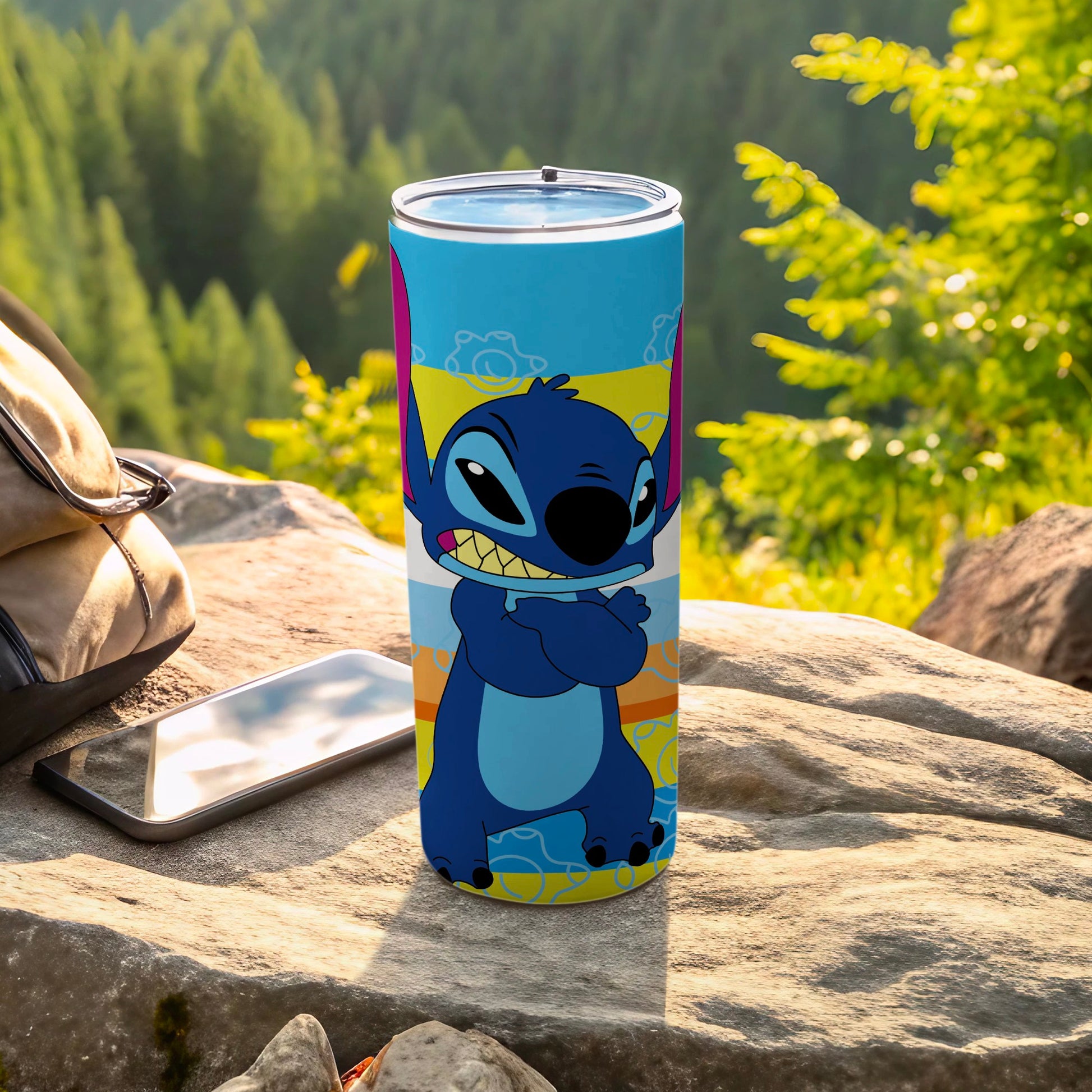 Blue Stitch character on a blue and yellow striped tumbler.
