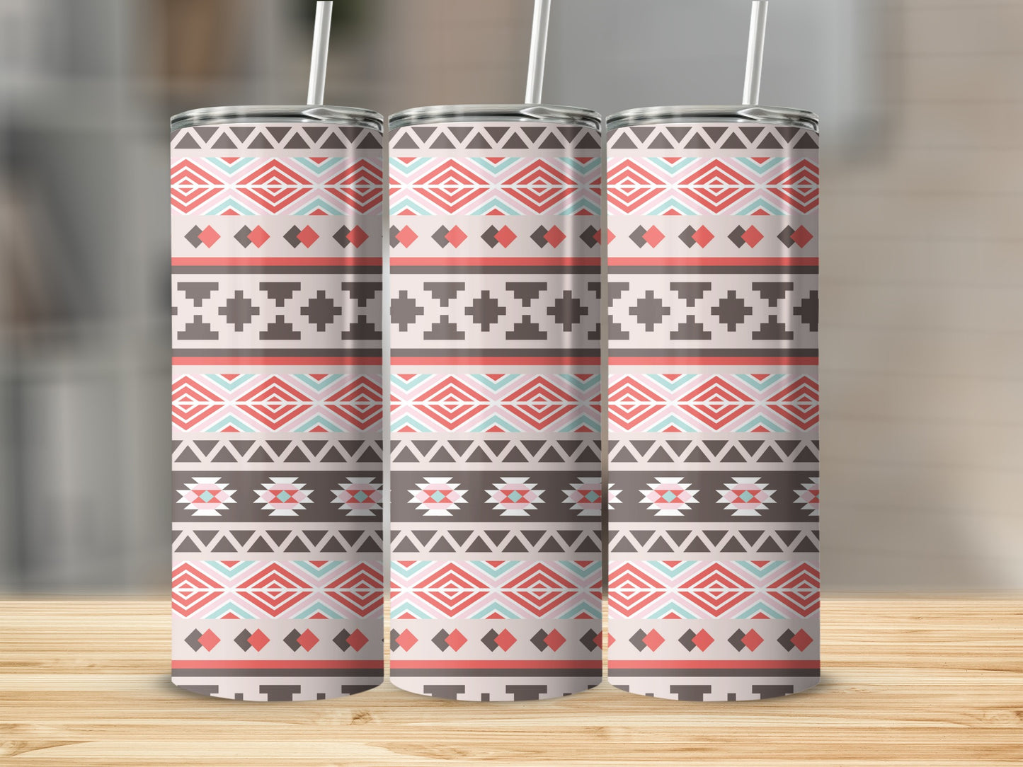 Three tumblers with a geometric tribal pattern in coral, teal, and brown.